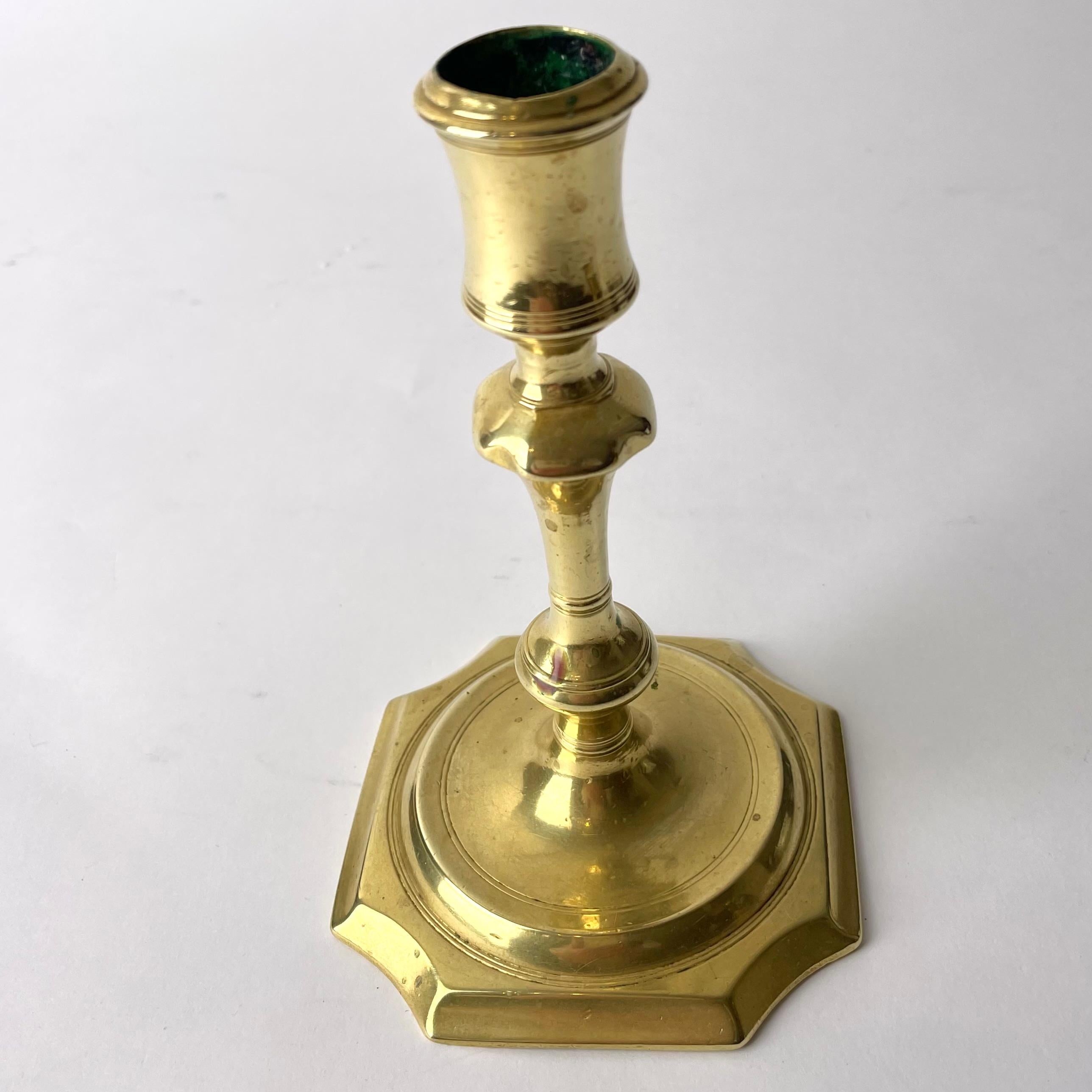 A cool Brass Candlestick in Swedish Baroque from early 18th Century. Beautiful wear and patina

Wear consistent with age and use 