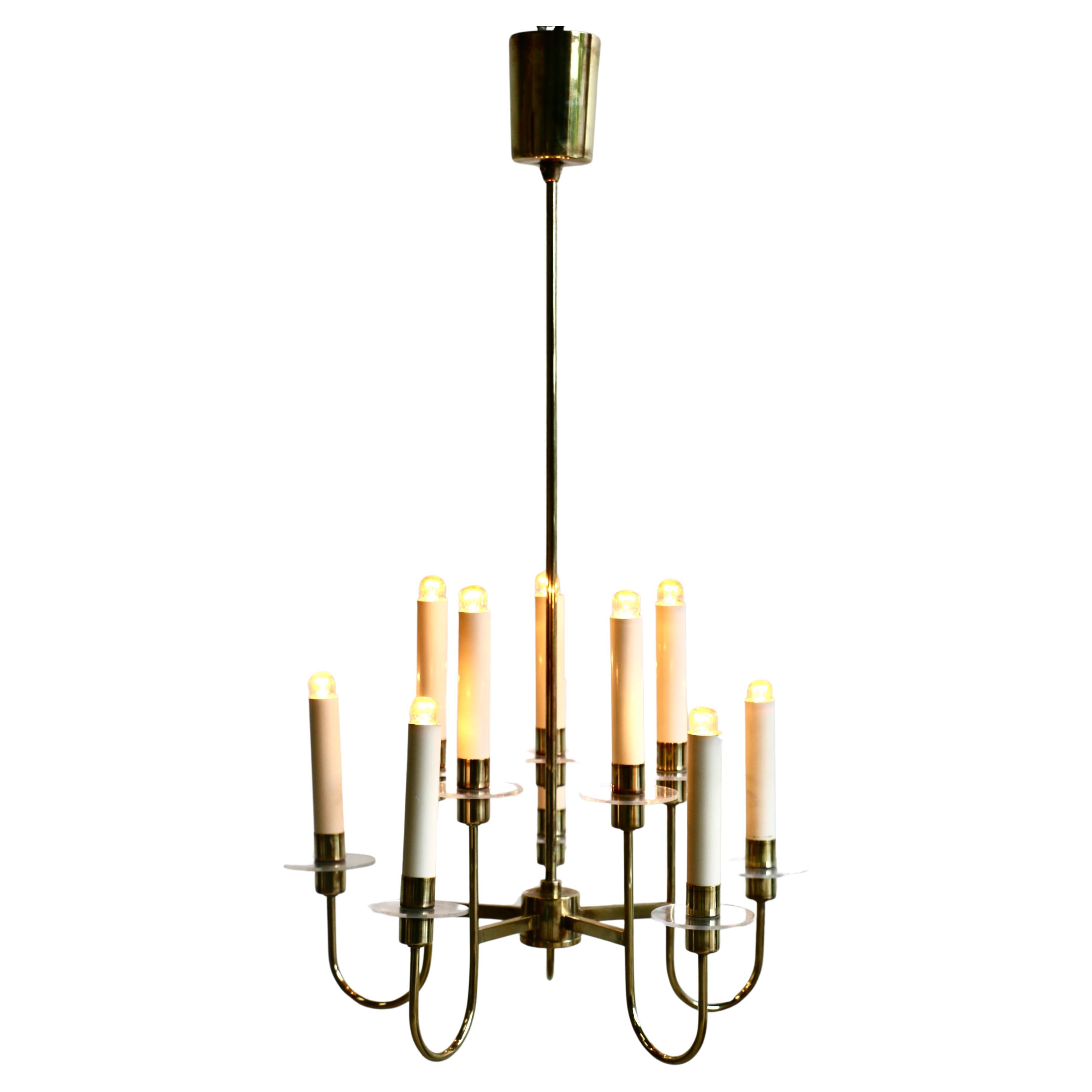 A brass chandelier. France 60's. For Sale