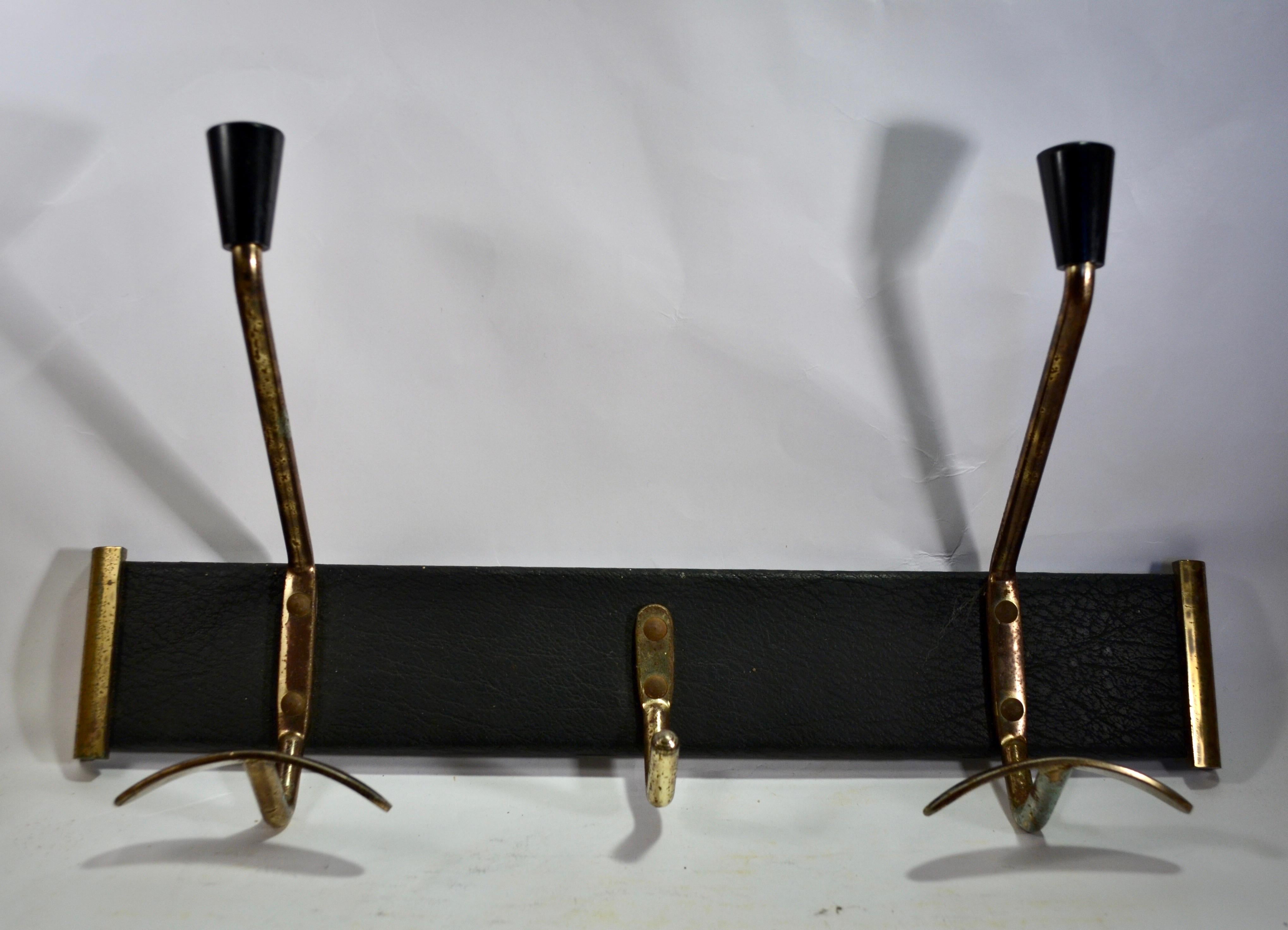 Brass A brass coat rack from the 1960s France. For Sale