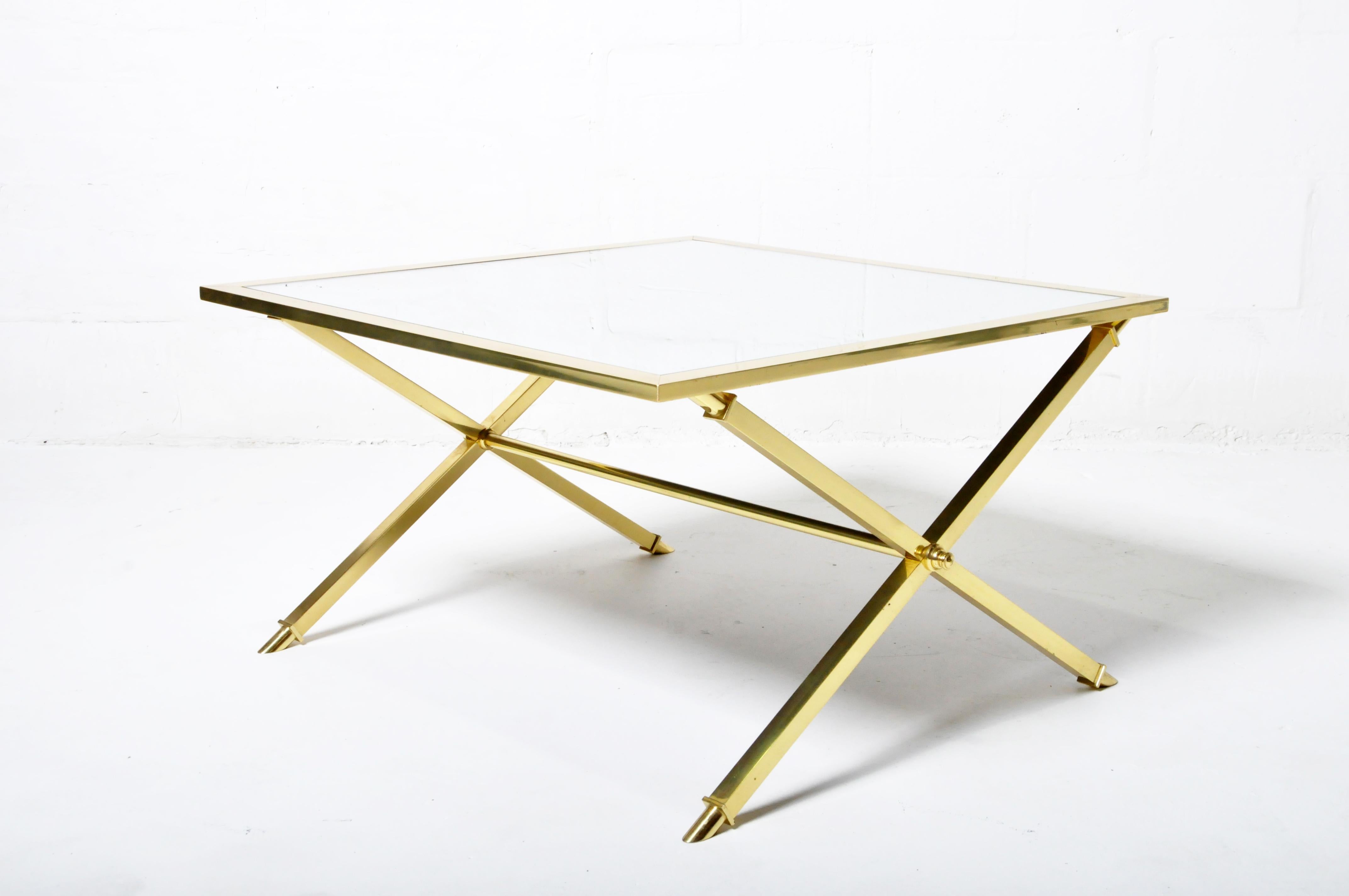 A brass and glass coffee table newly made a according to an Italian mid-century design.