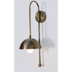 A Brass Dome Wall Sconce by Lamp Shaper