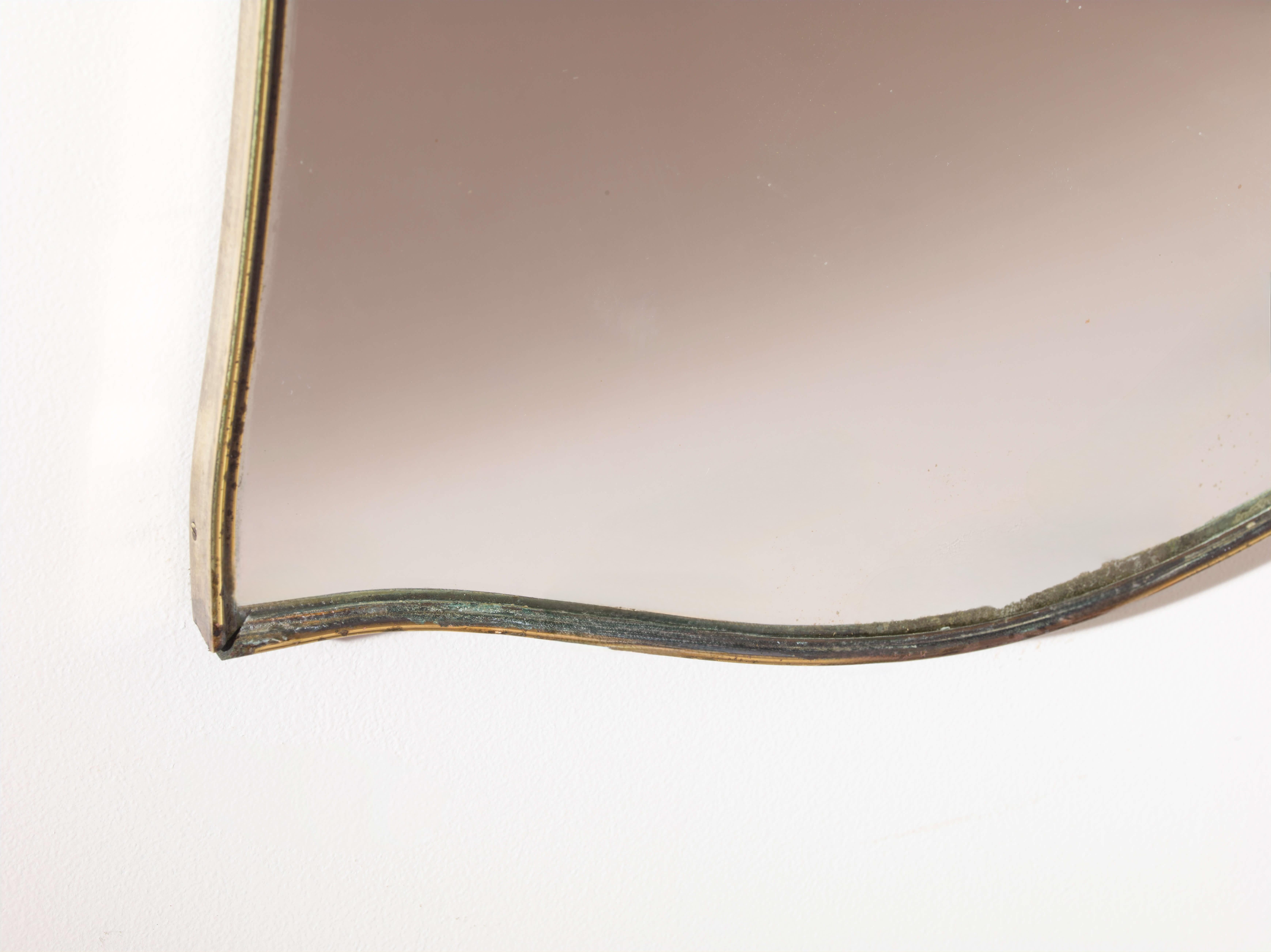 Mid-Century Modern A brass mirror with brass frame and mirrored glass, Italy, 1960s