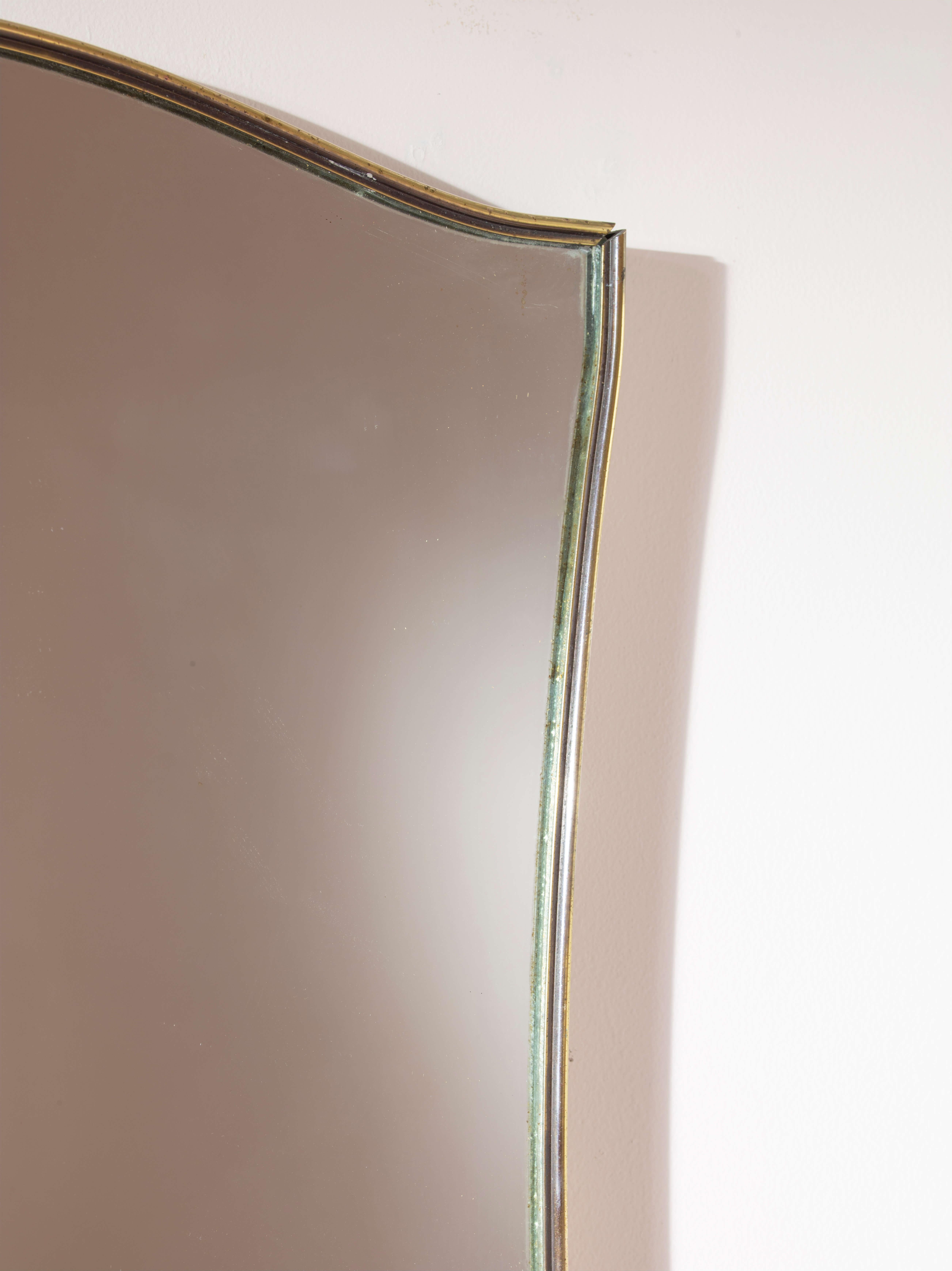 Italian A brass mirror with brass frame and mirrored glass, Italy, 1960s