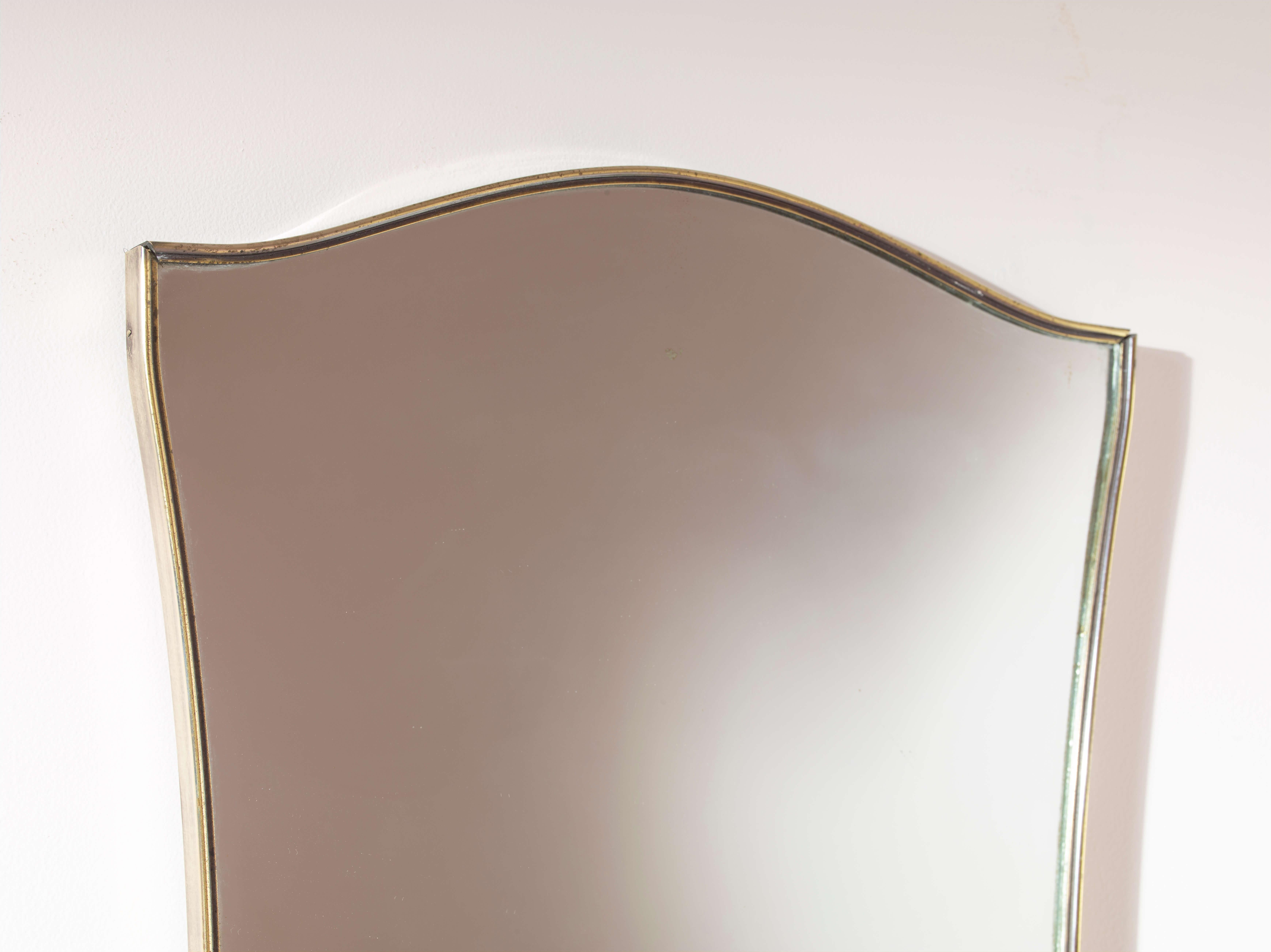 Mid-20th Century A brass mirror with brass frame and mirrored glass, Italy, 1960s