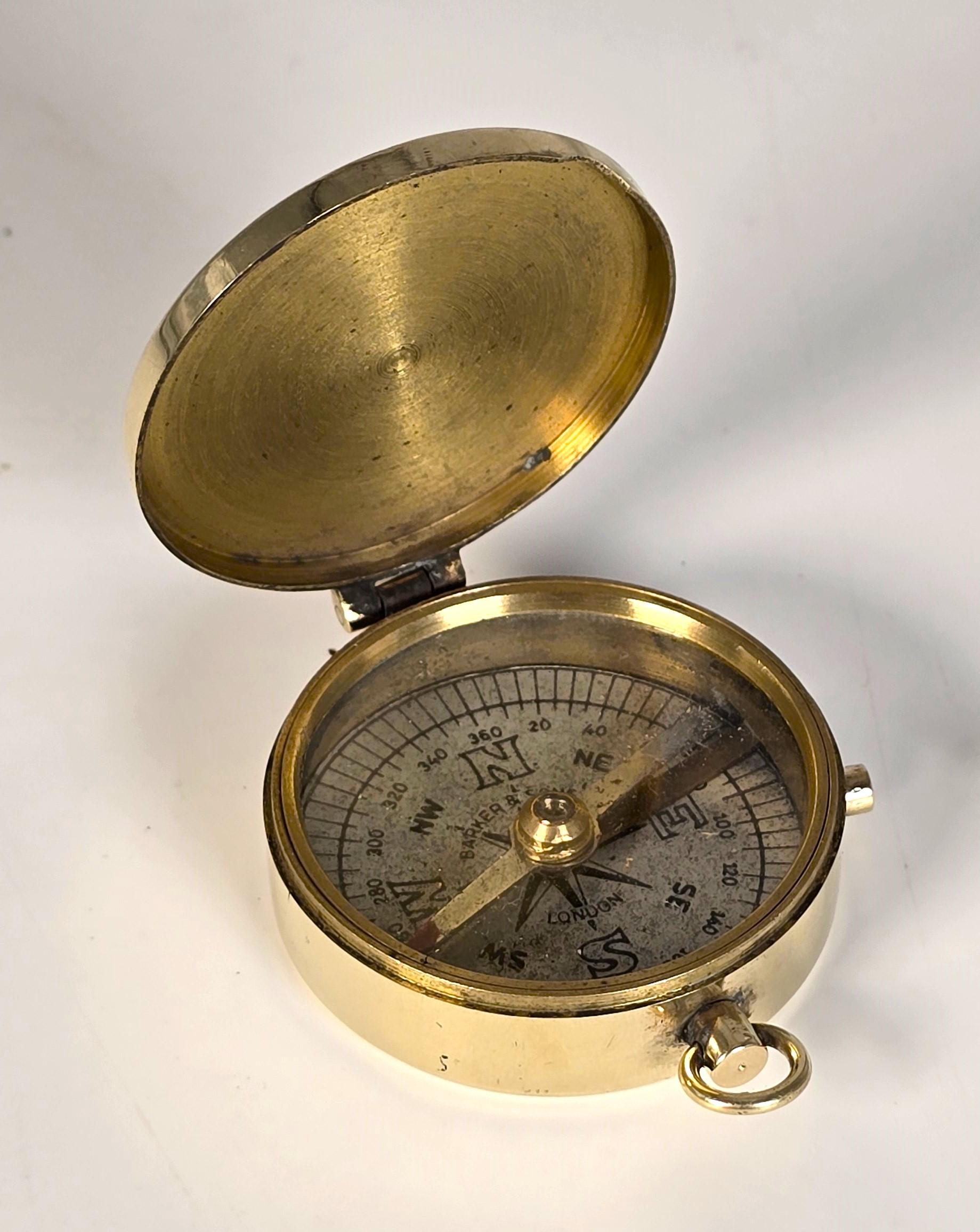 A brass pocket compass by Barker and Sons of London, English circa 1890 1