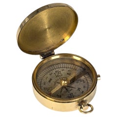 A brass pocket compass by Barker and Sons of London, English circa 1890