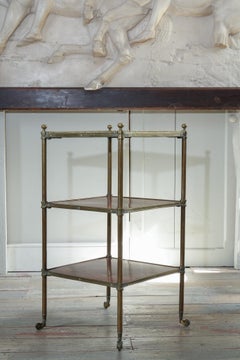 A Brass & Rosewood Three Tier Eatgere