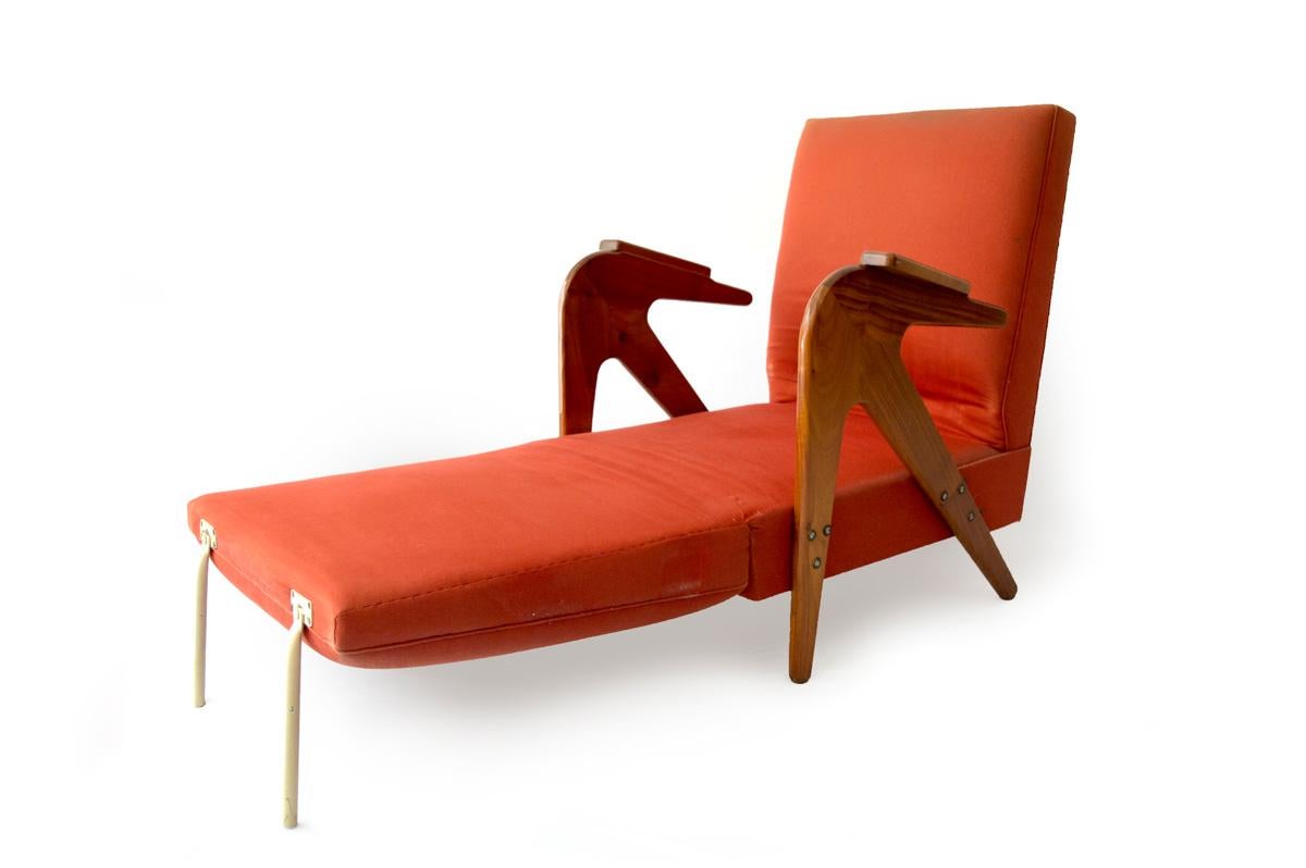 A mid-1950s Brazilian chaise lounge with solid hardwood frame, cushioned seat and back, adjustable to different positions. This type of chair was found on Brazilian houses and could be used as an extra bed when necessary.
