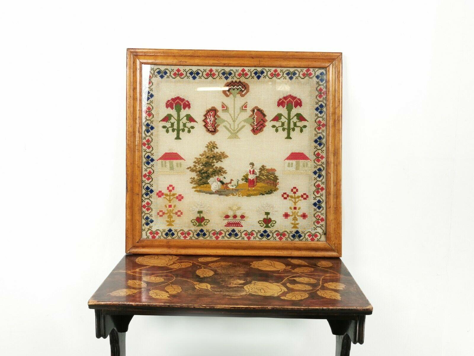 Victorian woolwork sampler

A brightly coloured 19th century Victorian woolwork sampler in a detailed maple frame.

For sale is a brightly coloured Victorian woolwork sampler. The sampler is of a typical Victorian scene. A young woman is feeding