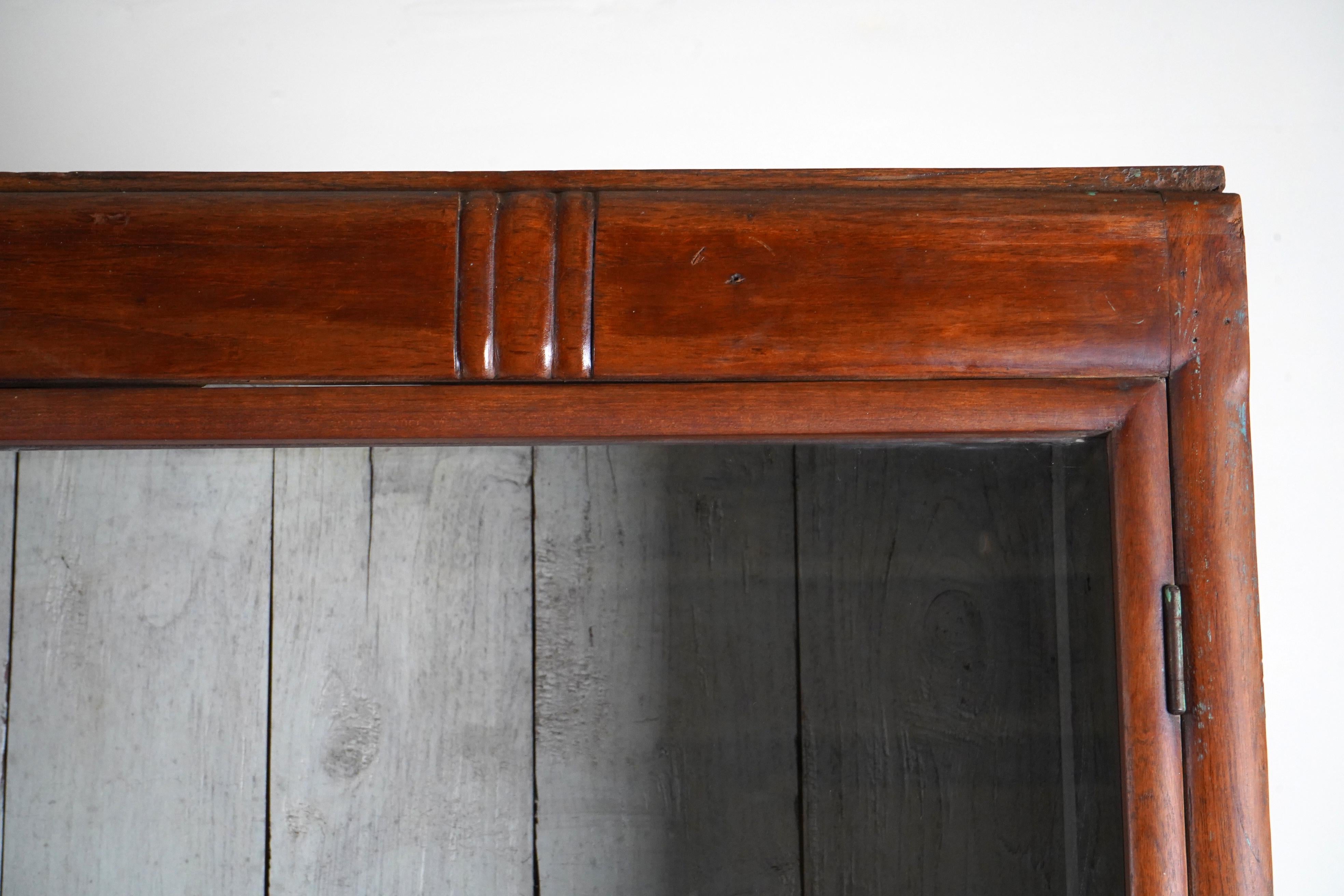 A British Colonial Art Deco Teak Bookcase with Lower Storage  For Sale 4