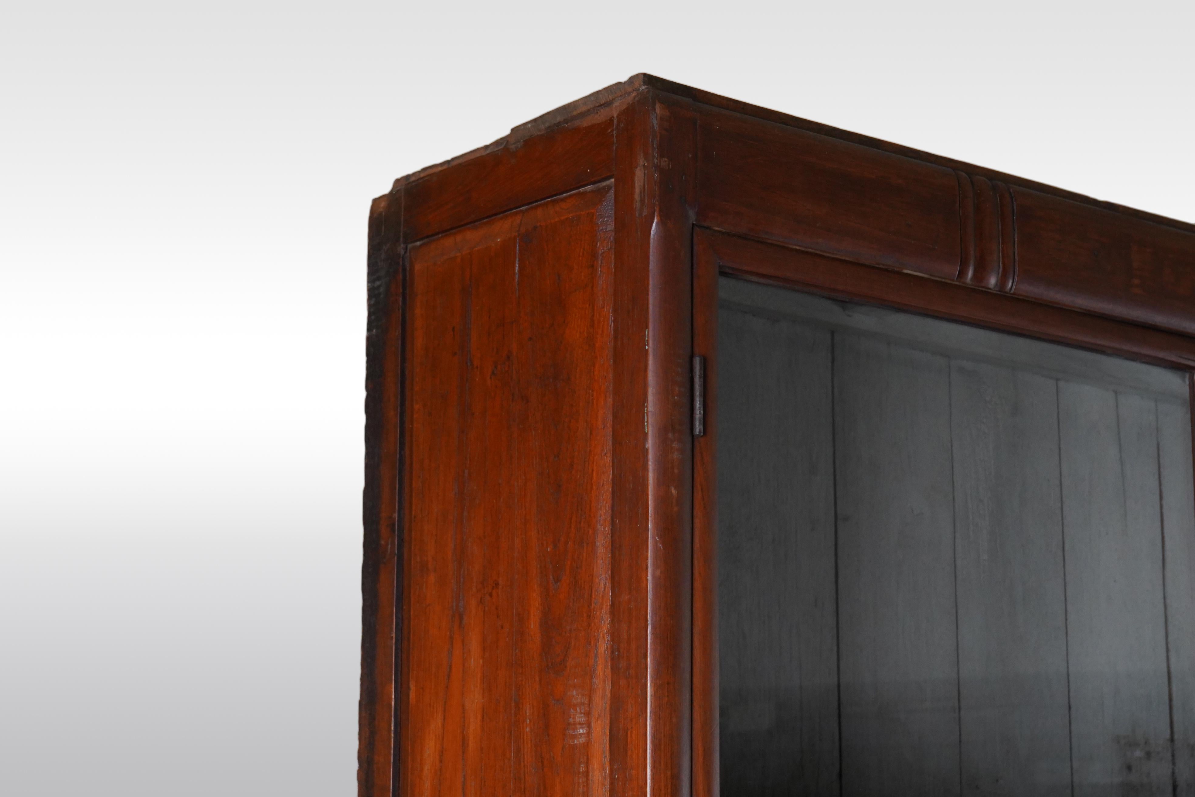 A British Colonial Art Deco Teak Bookcase with Lower Storage  For Sale 5