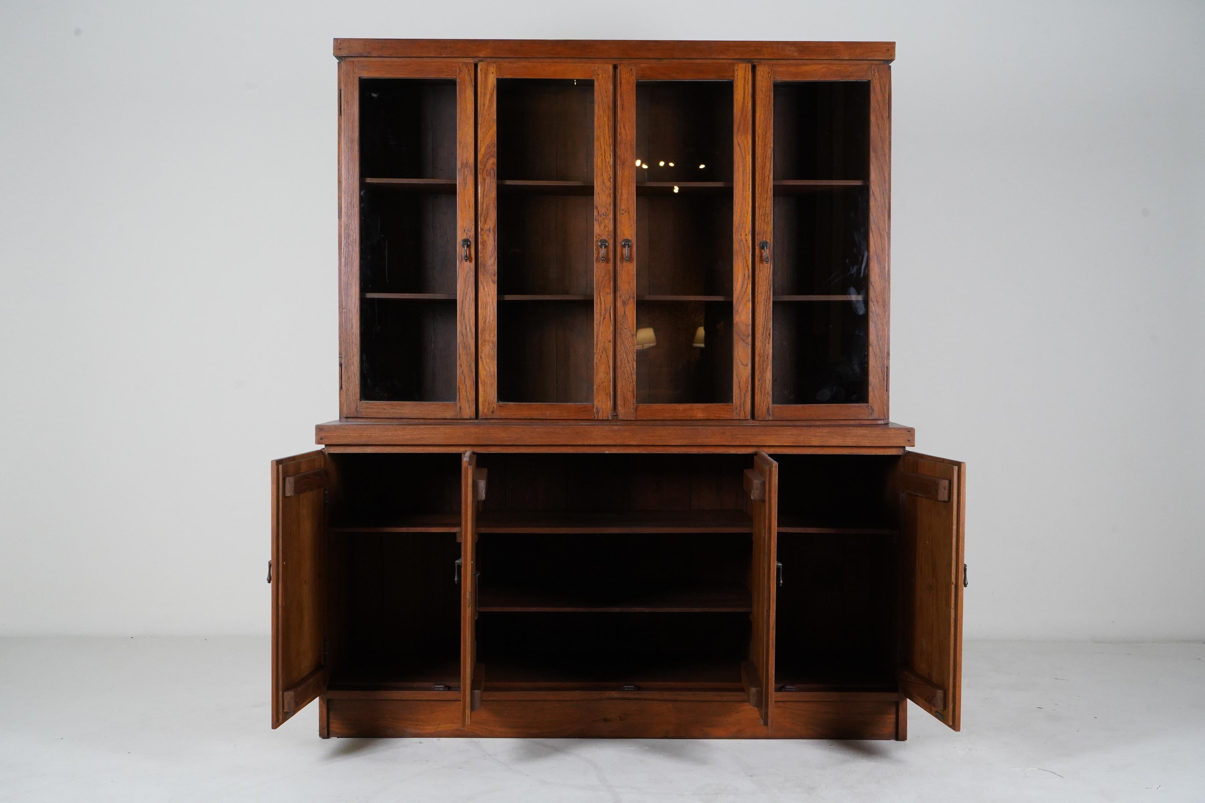 20th Century A British Colonial Bookcase with Bottom Storage