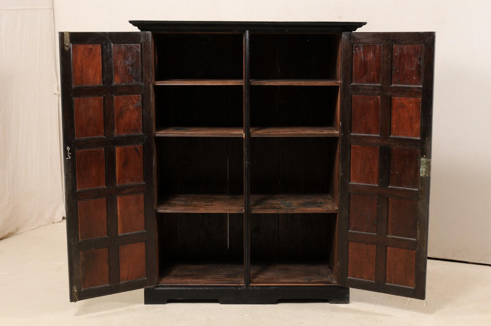British Colonial Ebonized Wood Cabinet from Mid-20th Century In Good Condition In Atlanta, GA