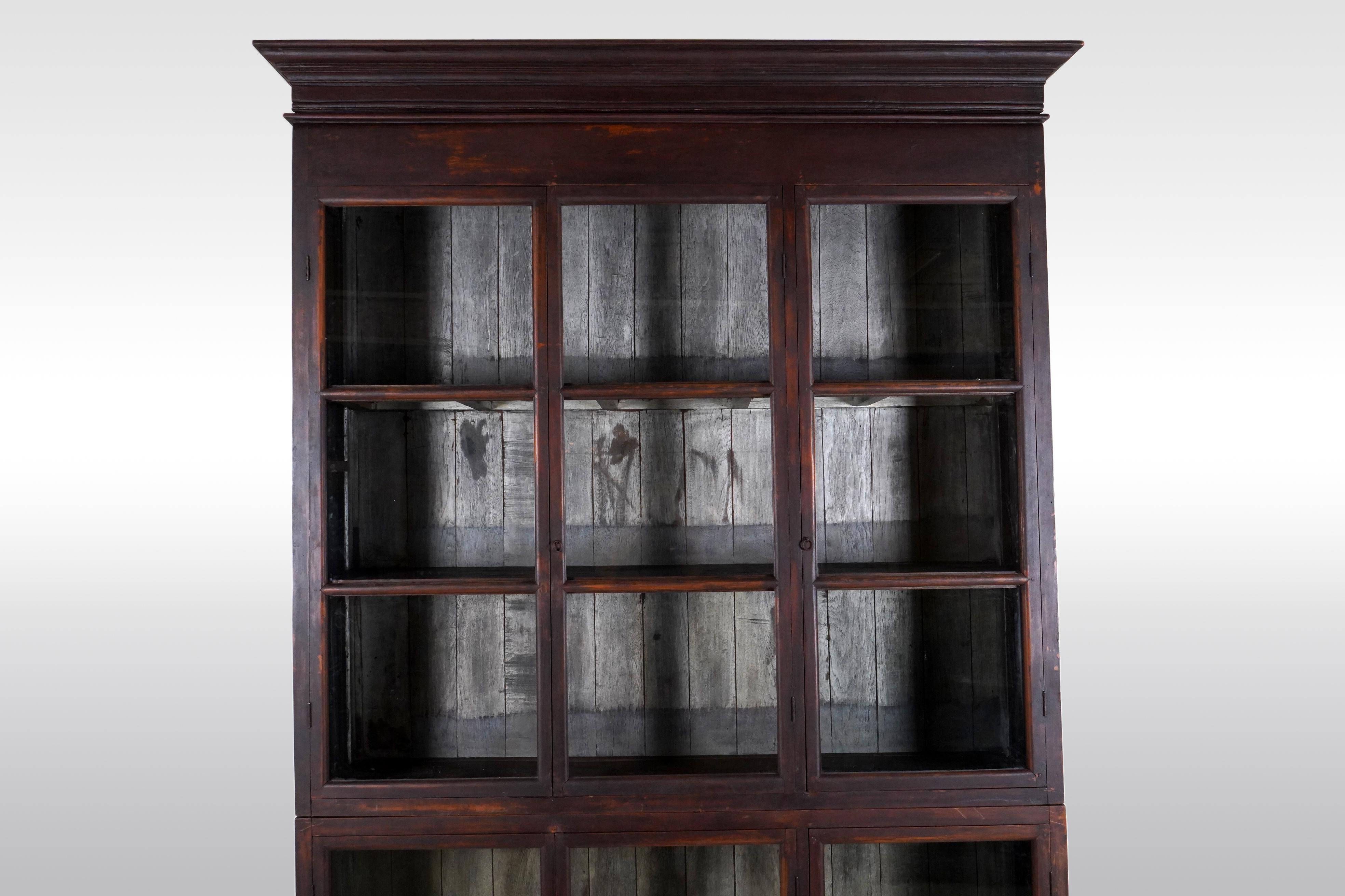 A British Colonial Teak Wood Bookcase For Sale 1