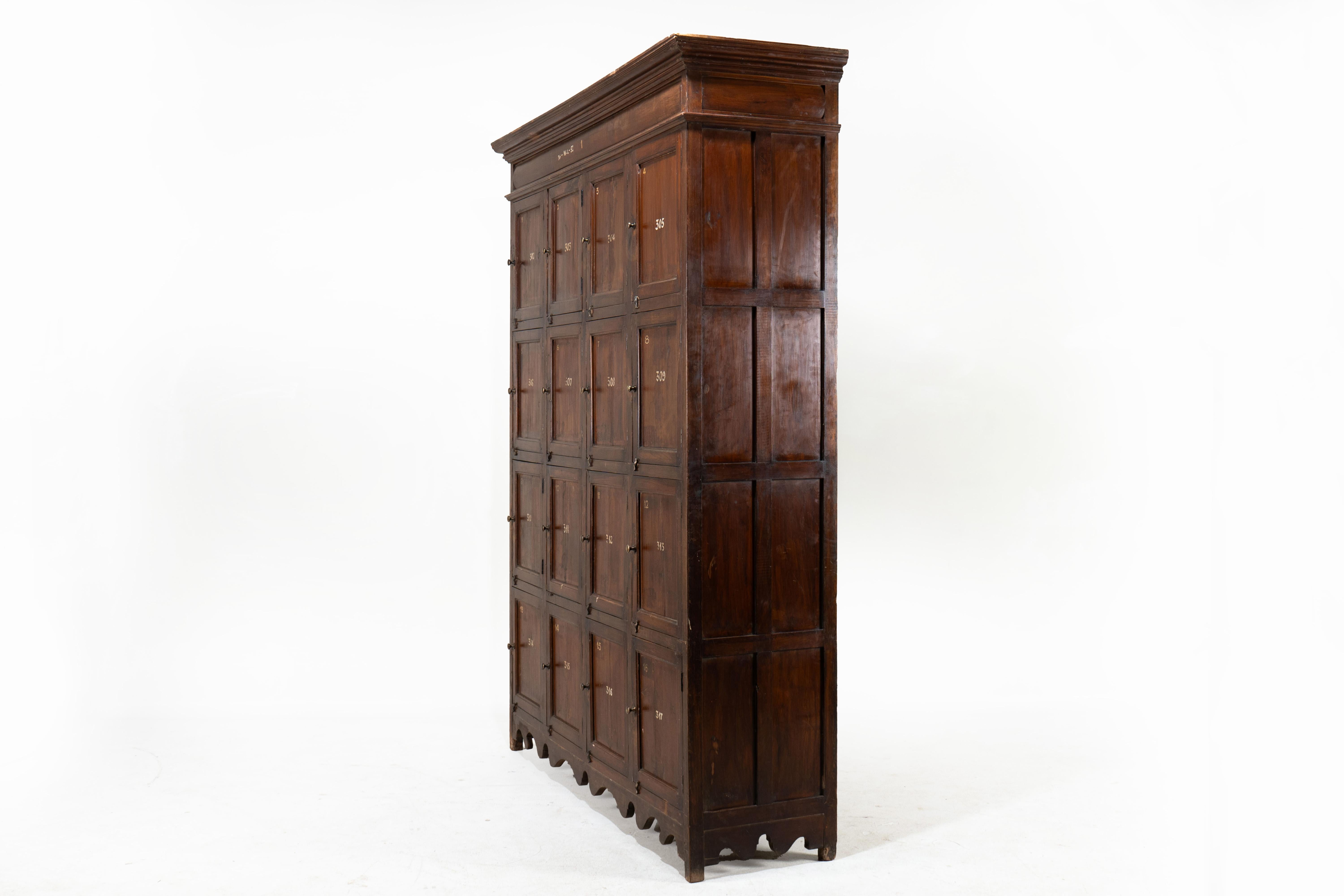 A British Colonial Teakwood Numbered Locker In Good Condition In Chicago, IL