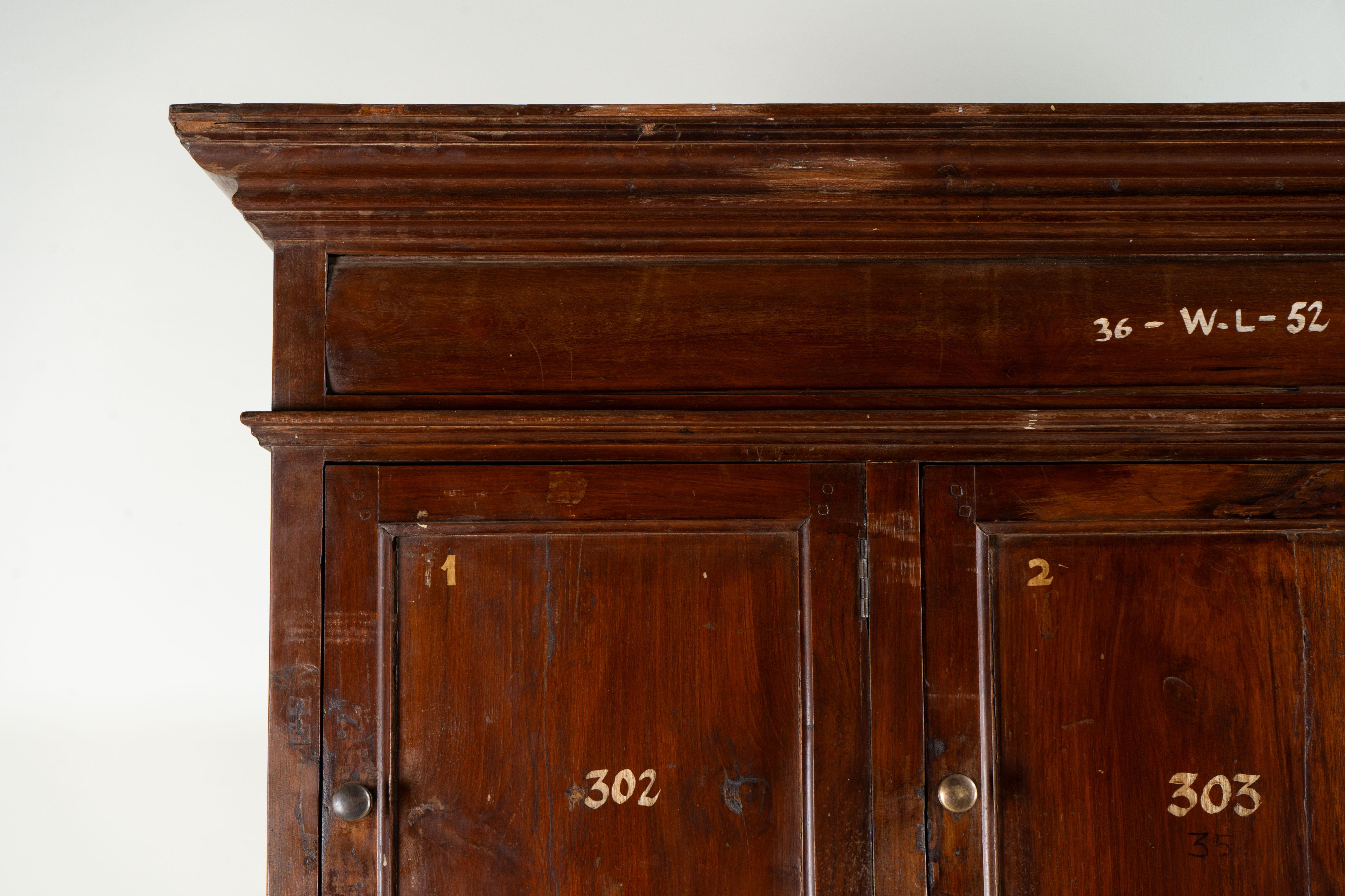 A British Colonial Teakwood Numbered Locker 1