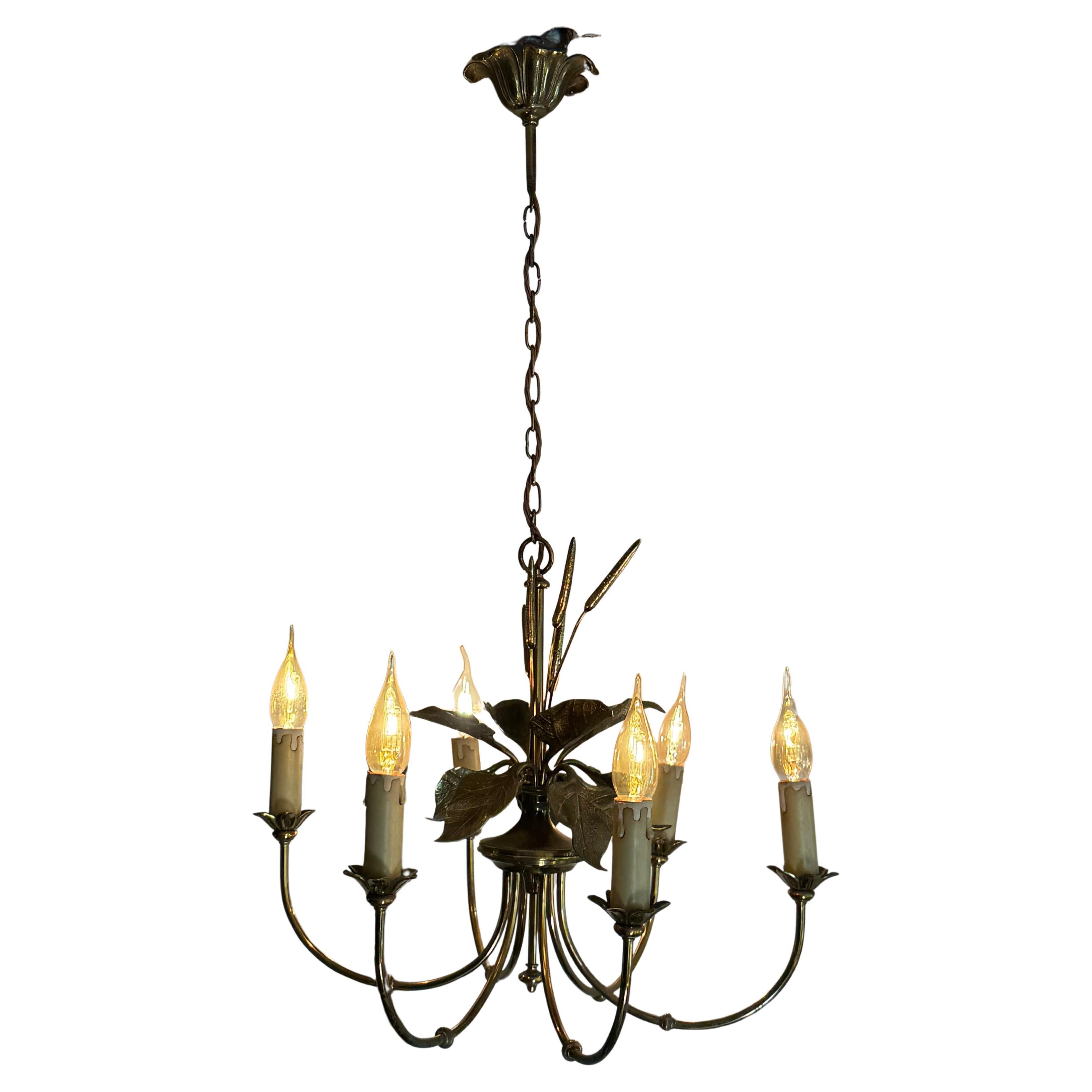 A bronze chandelier attributed to Maison Charles For Sale