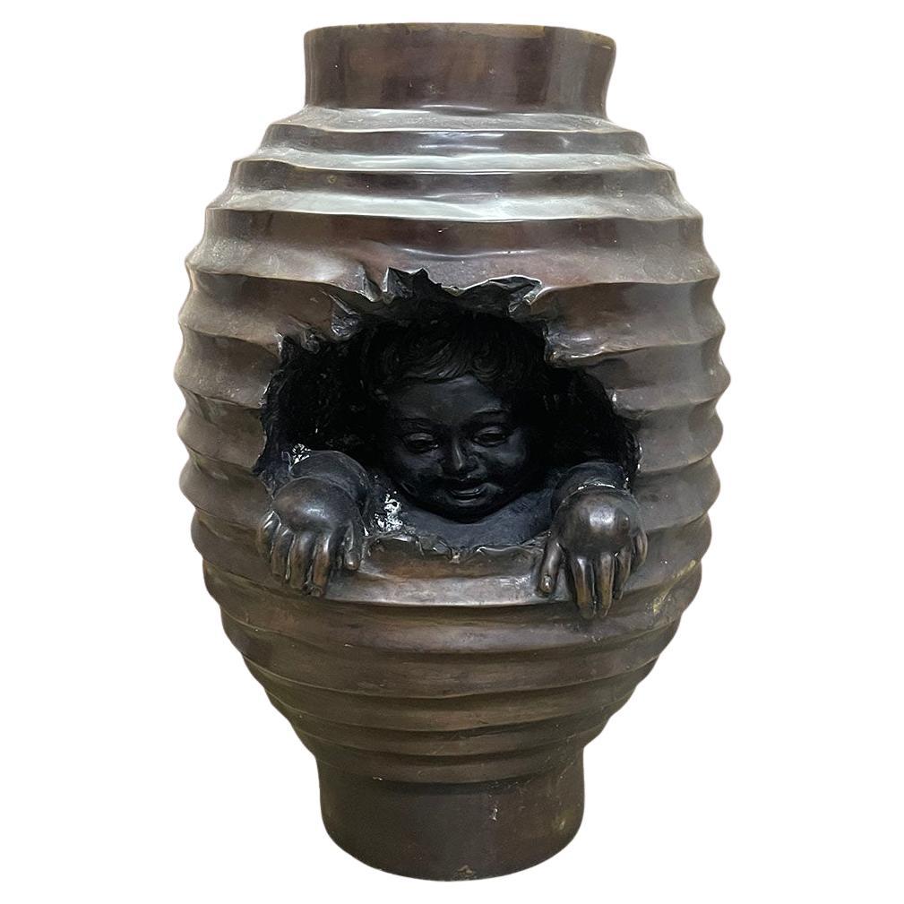 A bronze-colored side pedestal or plant table For Sale