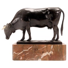 Une sculpture de vache en bronze signée Moseriz, France 1880. 