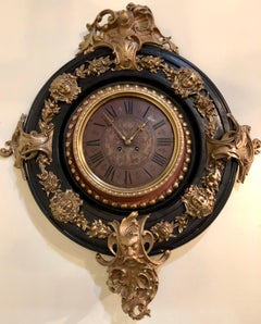 Bronze & Ebony Circular Wall Clock with Satirical and Female Face