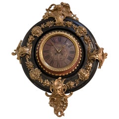 Bronze & Ebony Circular Wall Clock with Satirical and Female Face