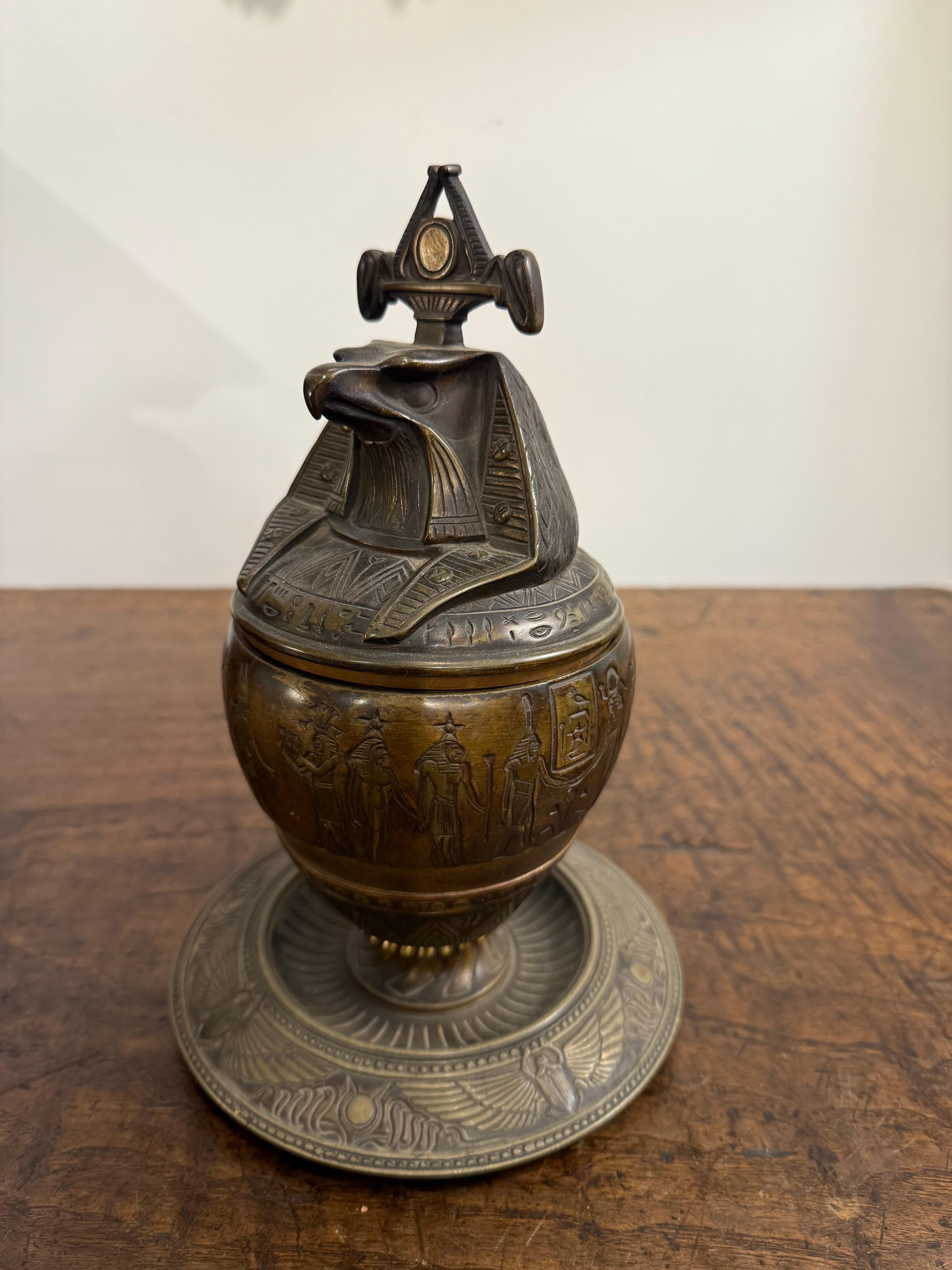 Egyptian A Bronze Falcon Headed Canopic Jar, Early 20th Century For Sale