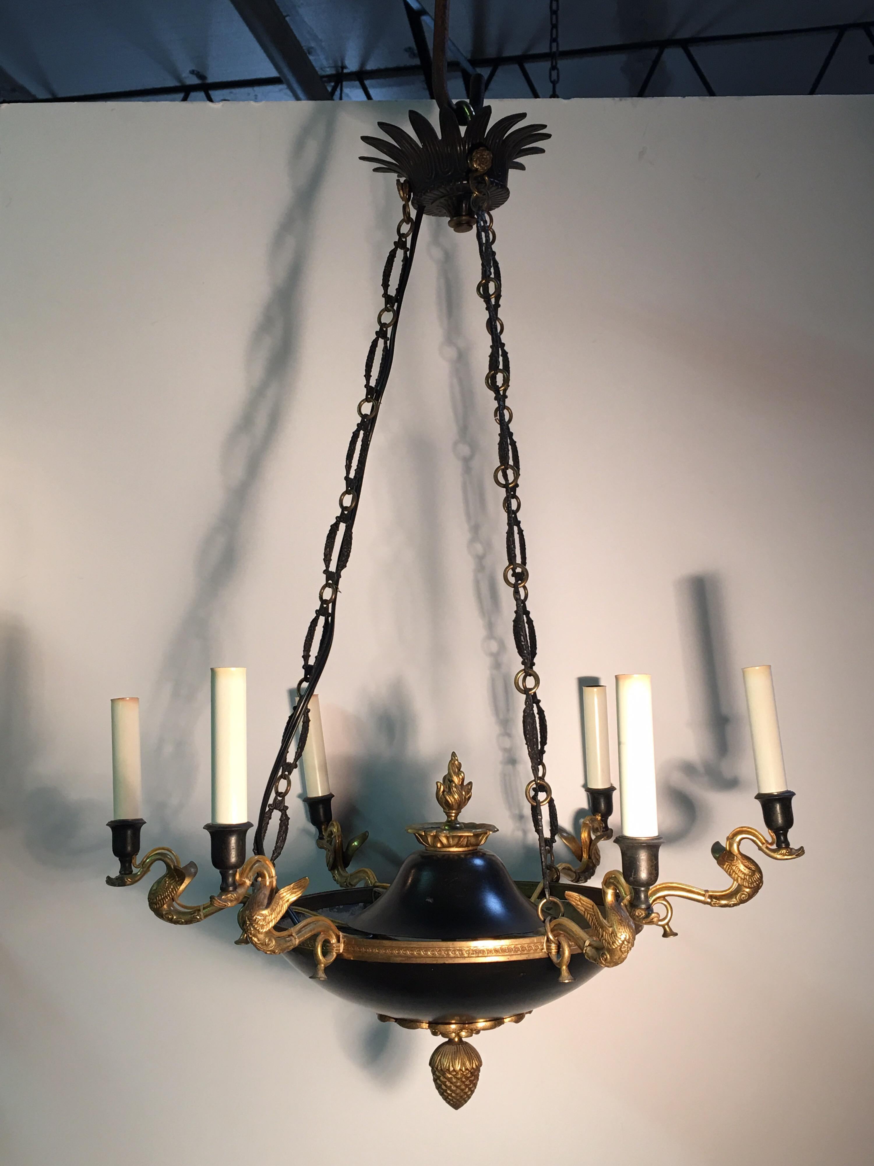 A French Empire style bronze chandelier.