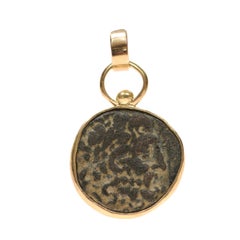 A Bronze Greek [coin] pendant w 18 karat gold (pendant only)