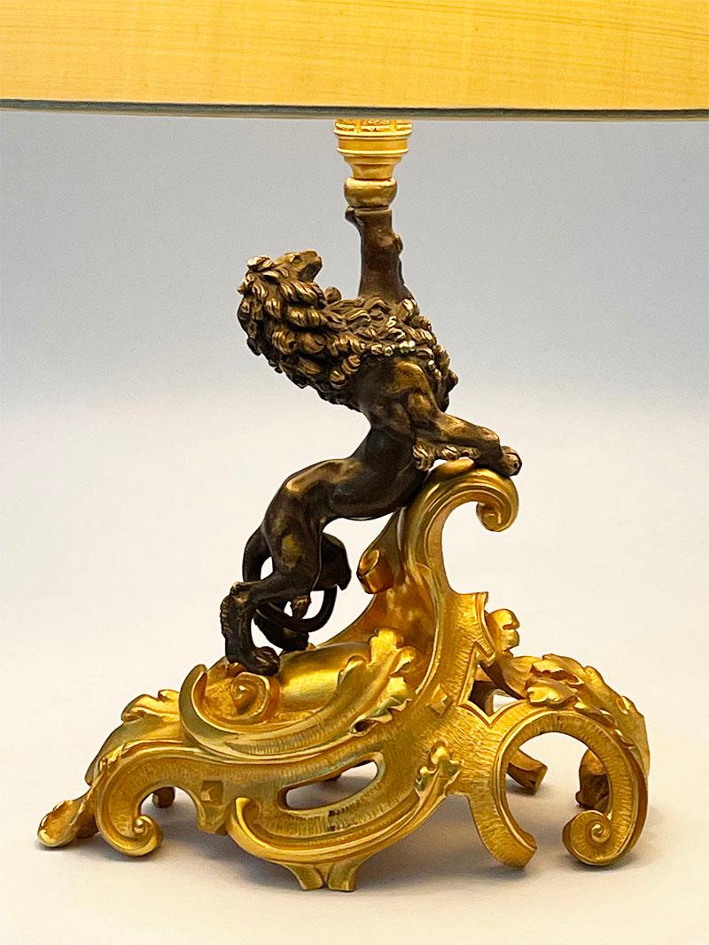 Dutch Bronze Lamp with Curled Leaf Gilded Base and Standing Lion For Sale