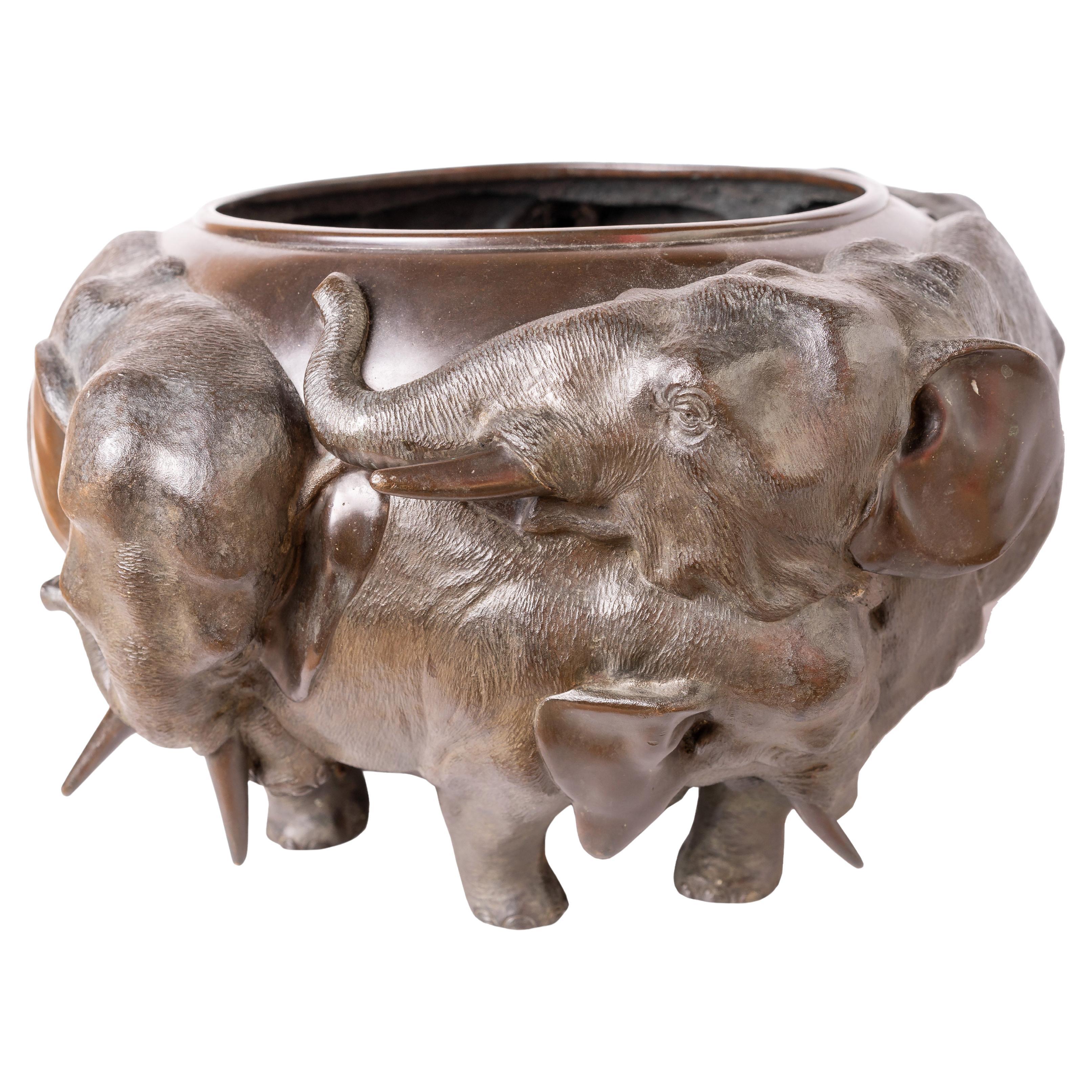 A Bronze Meiji Period Elephant Jardiniere For Sale