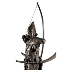 A Bronze Okimono Depicting a Samurai Archer, Signed Yoshimitsu