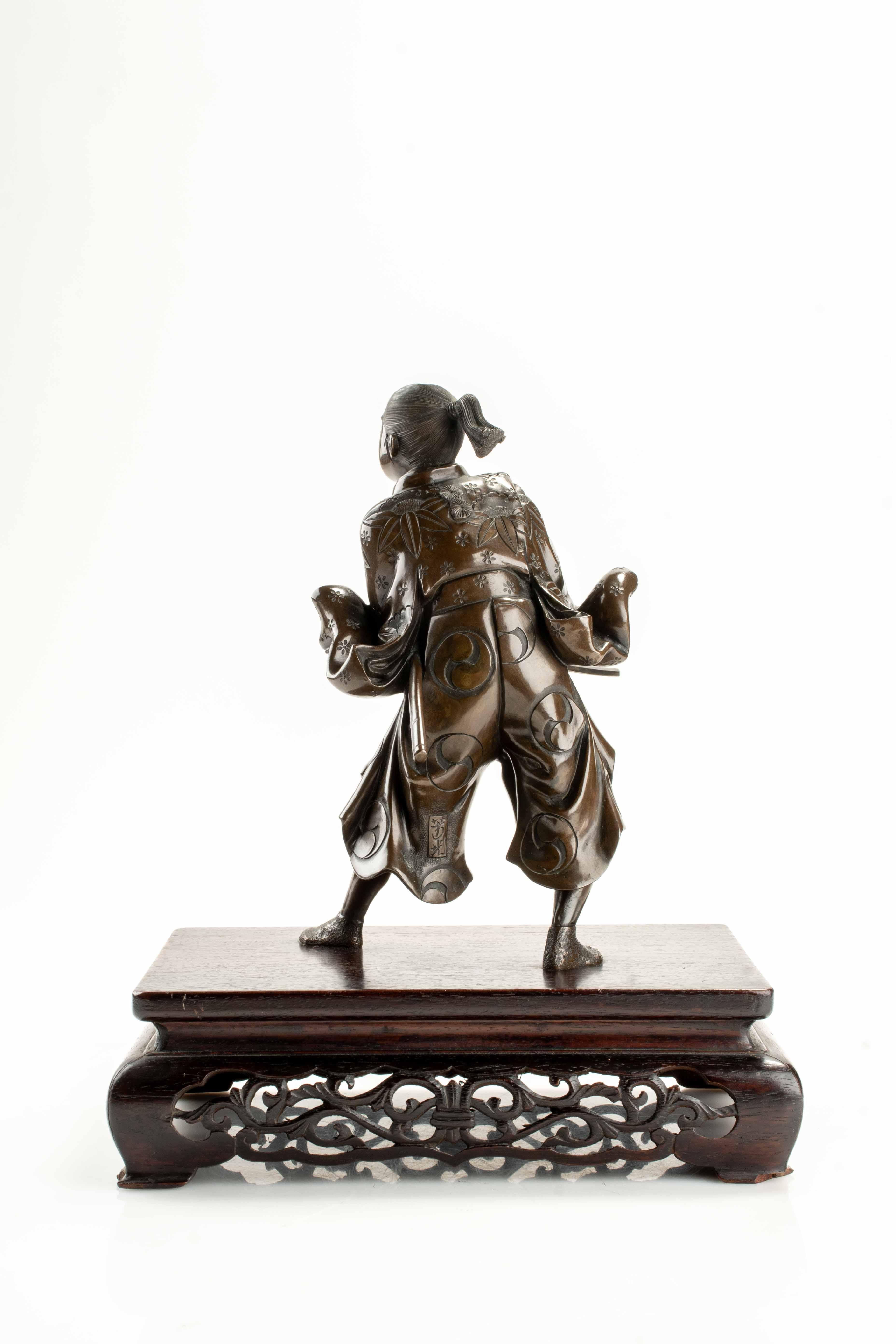 Metalwork A bronze okimono depicting a young samurai with a katana, signed Yoshimitsu For Sale
