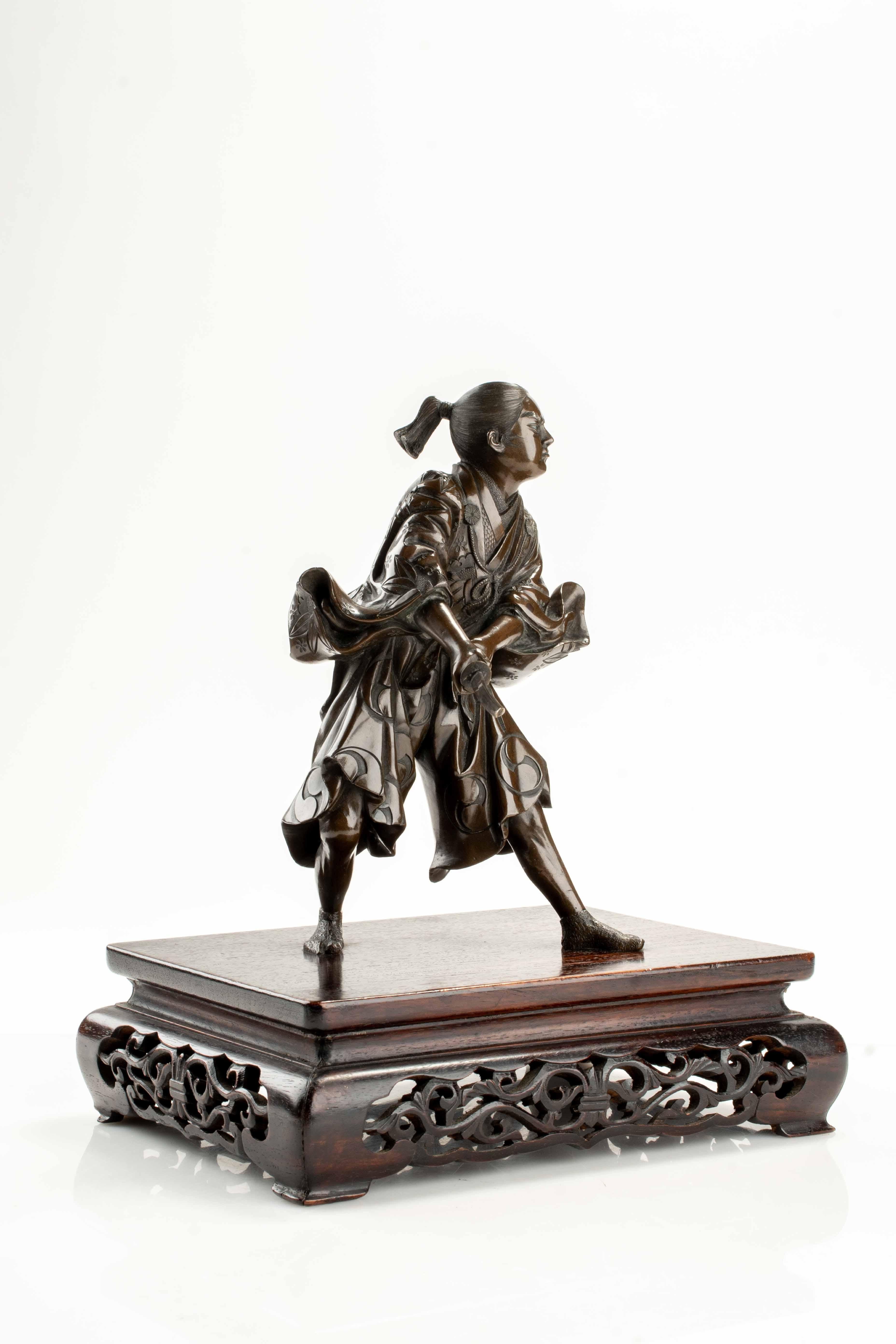 19th Century A bronze okimono depicting a young samurai with a katana, signed Yoshimitsu For Sale