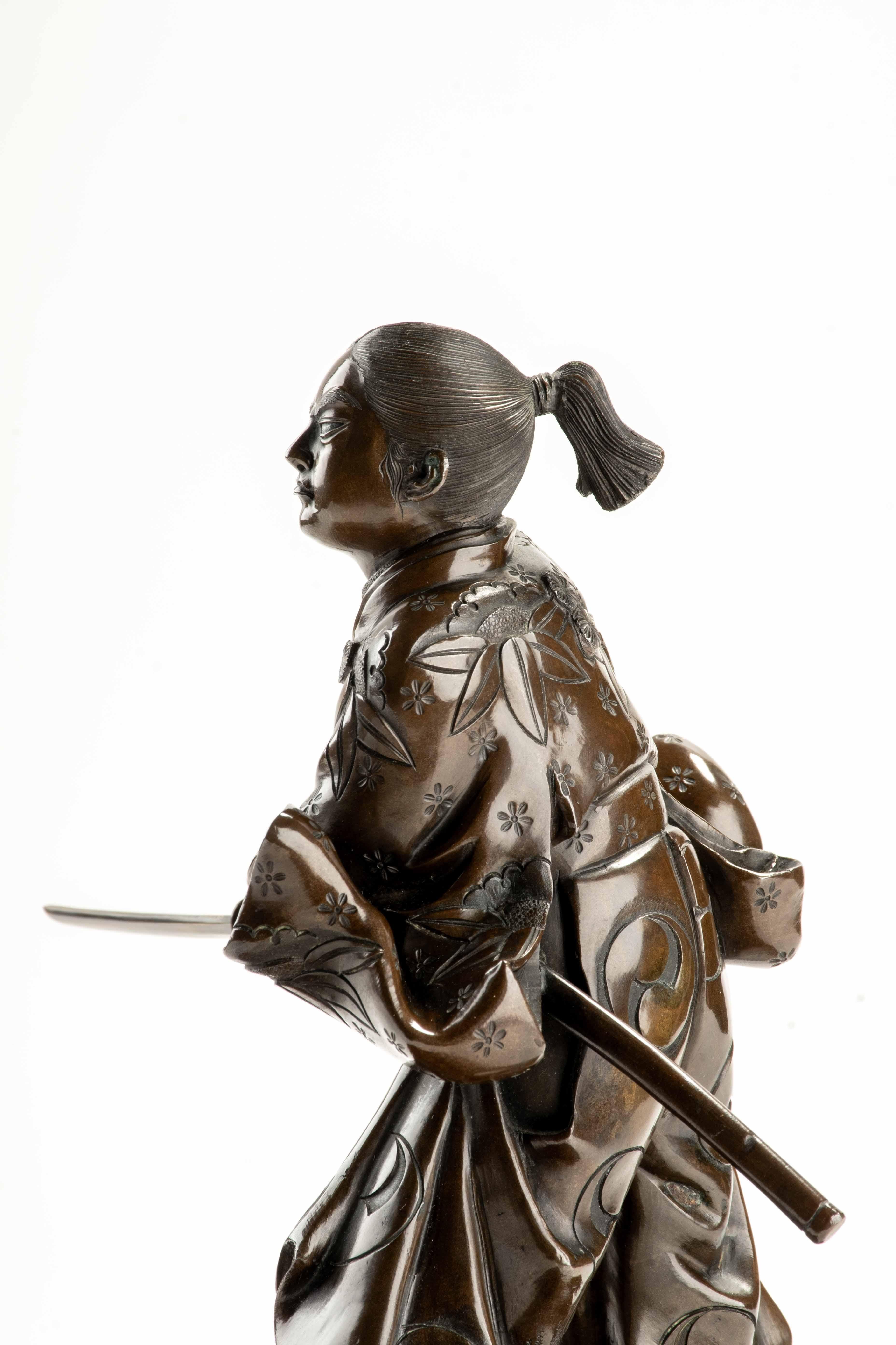 A bronze okimono depicting a young samurai with a katana, signed Yoshimitsu For Sale 1
