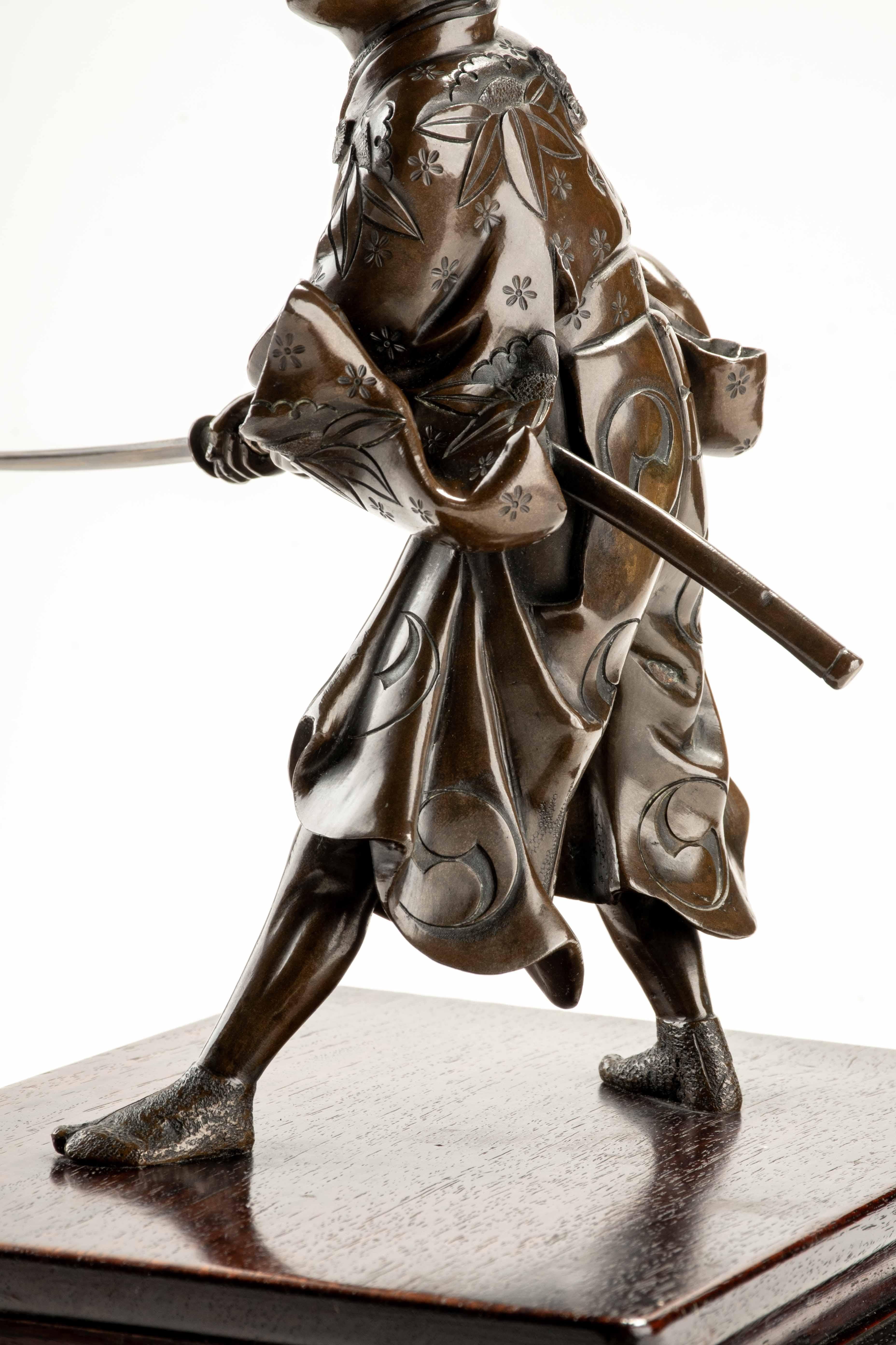 A bronze okimono depicting a young samurai with a katana, signed Yoshimitsu For Sale 2
