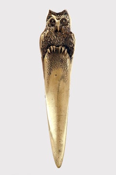 A bronze paper knife opener dipicting a perched owl, Austria 1890.