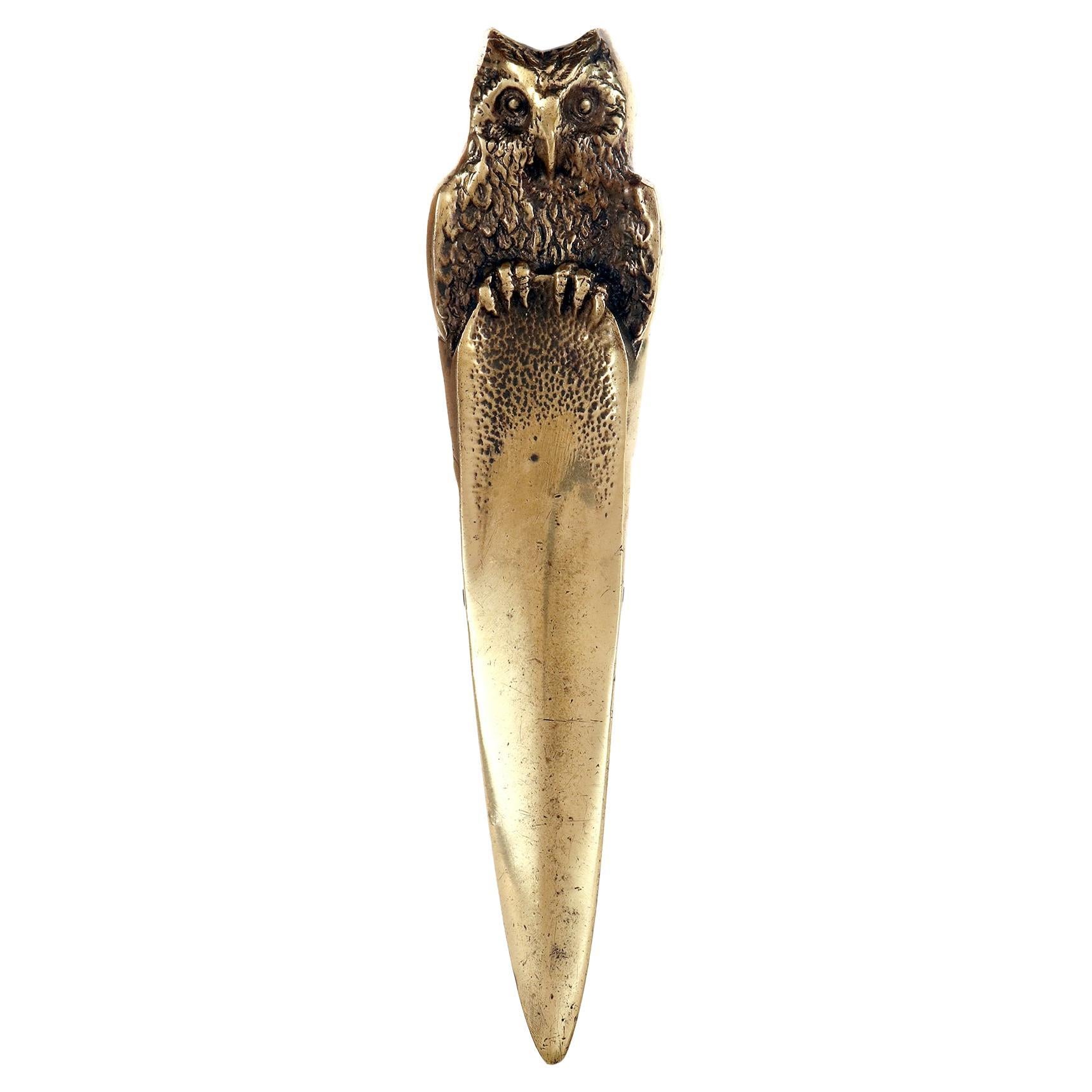 A bronze paper knife opener dipicting a perched owl, Austria 1890.