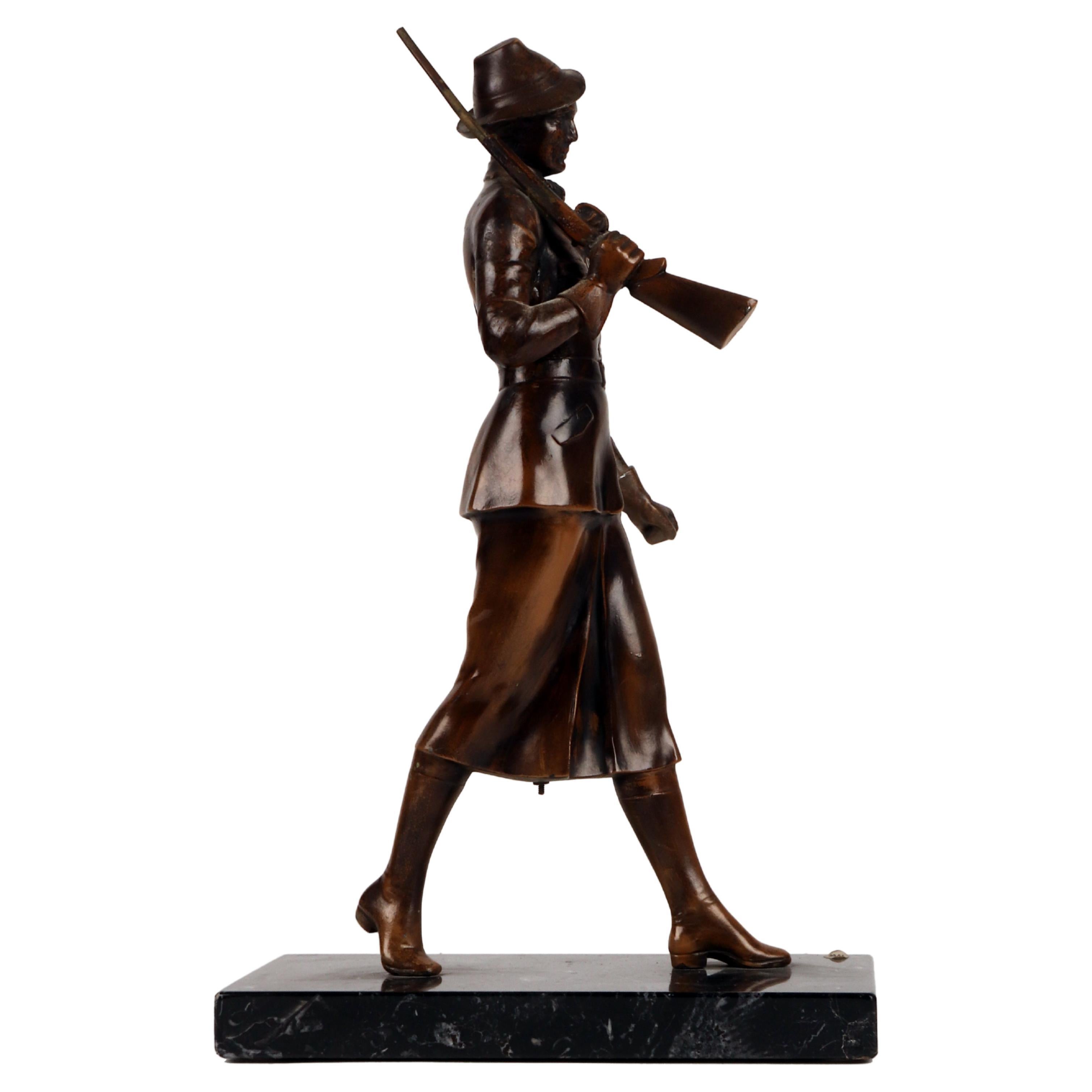 A bronze sculpture depicting a huntress with rifle, Austria 1920.  For Sale