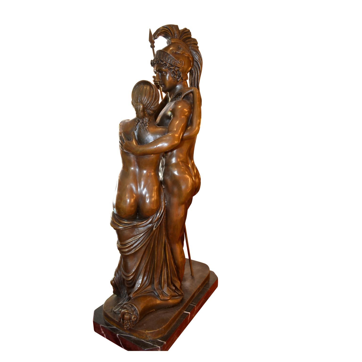 A late 19 century bronze statue of Mars and Venus, after the original life-size marble statue by Antonio Canova (1757-1822), displayed at one end of the Marbles Hall in Buckingham Palace in London.   In the allegory, the partially draped Roman