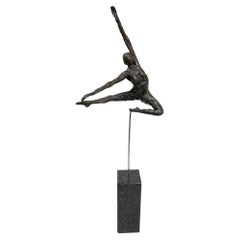 A bronze statue of a ballerina