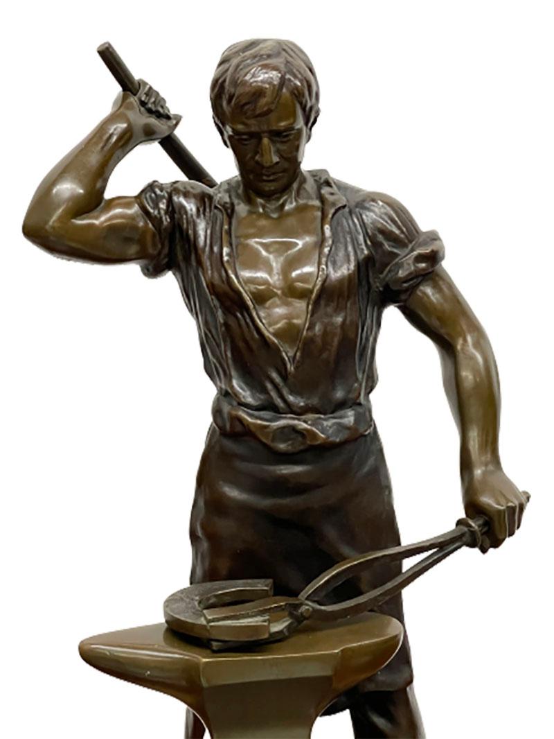 A bronze statue of a farrier. 

A male figure in bronze on a black marble base. 
The tools are separate parts. 
The bronze is signed, not decipherable by whom. 

The height of the statue is 45 cm and the marble base is 20 cm square. 
The