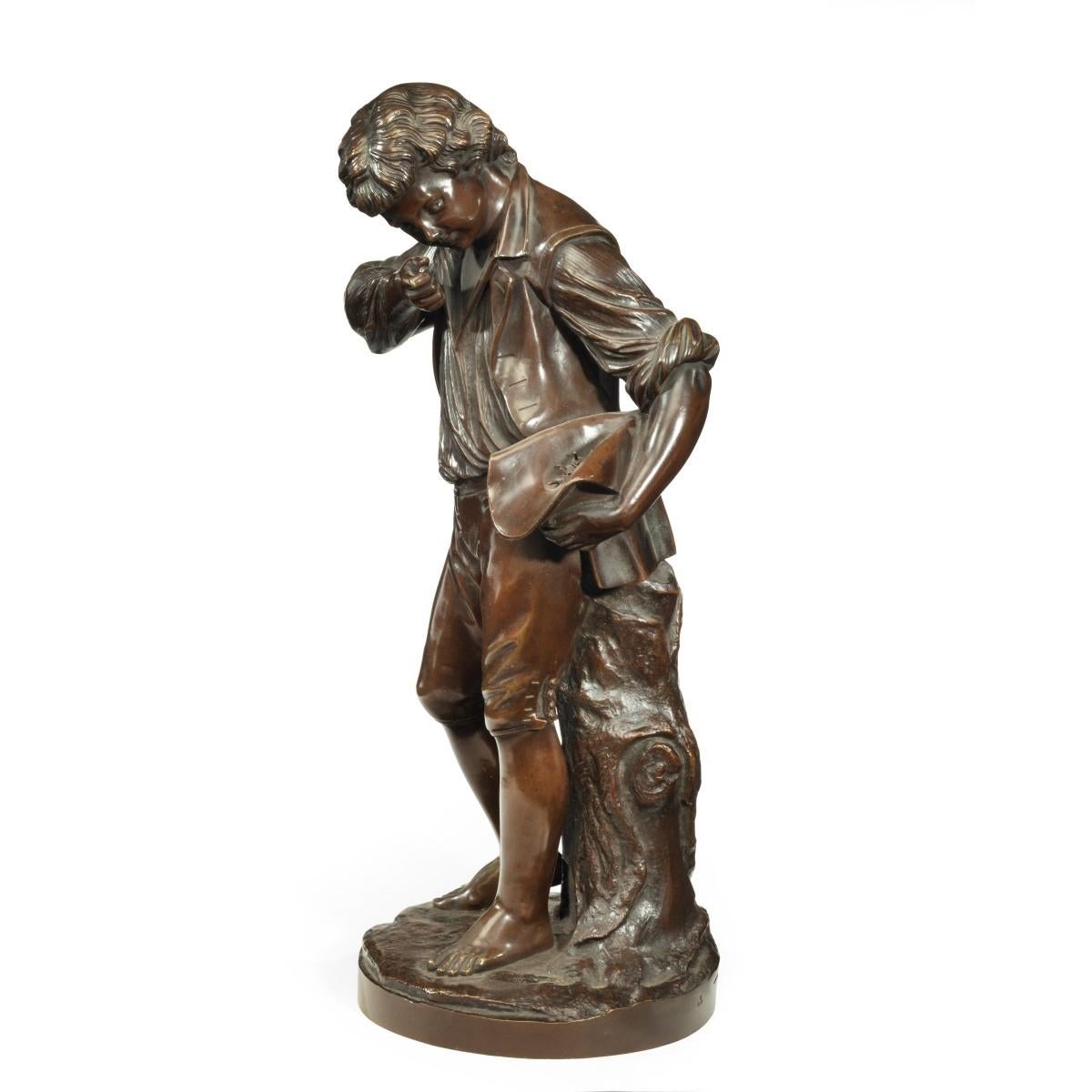 A bronze study of a boy collecting fruit in his wide brimmed hat, he is wearing a jerkin and breeches over a shirt rolled up at the sleeves, with one hand to his mouth and the other holding his upturned hat in which he has collected the fruit,