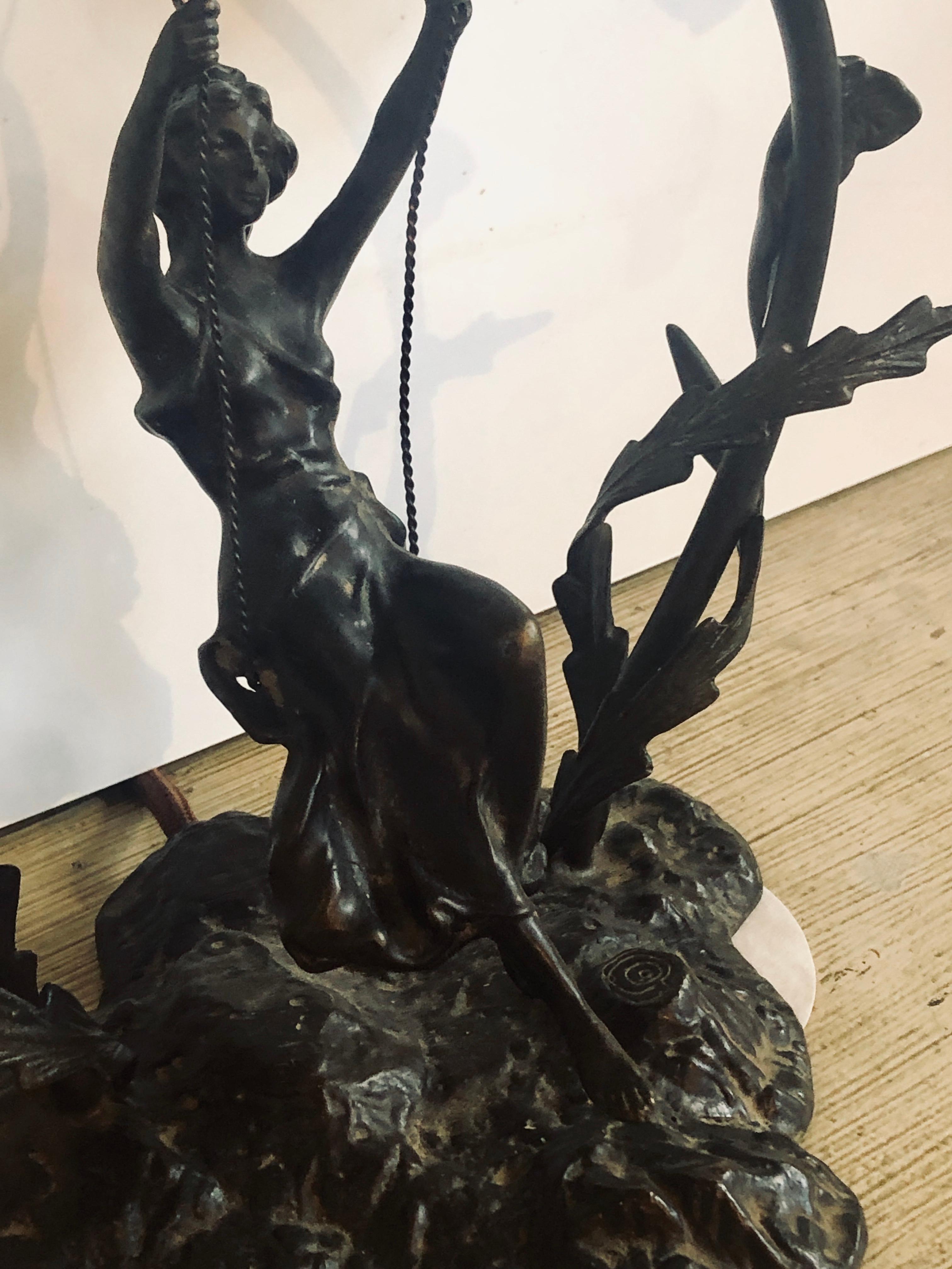 Bronze Table Lamp Depicting a Girl on a Swing w a Tiffany Style Glass Shade 1