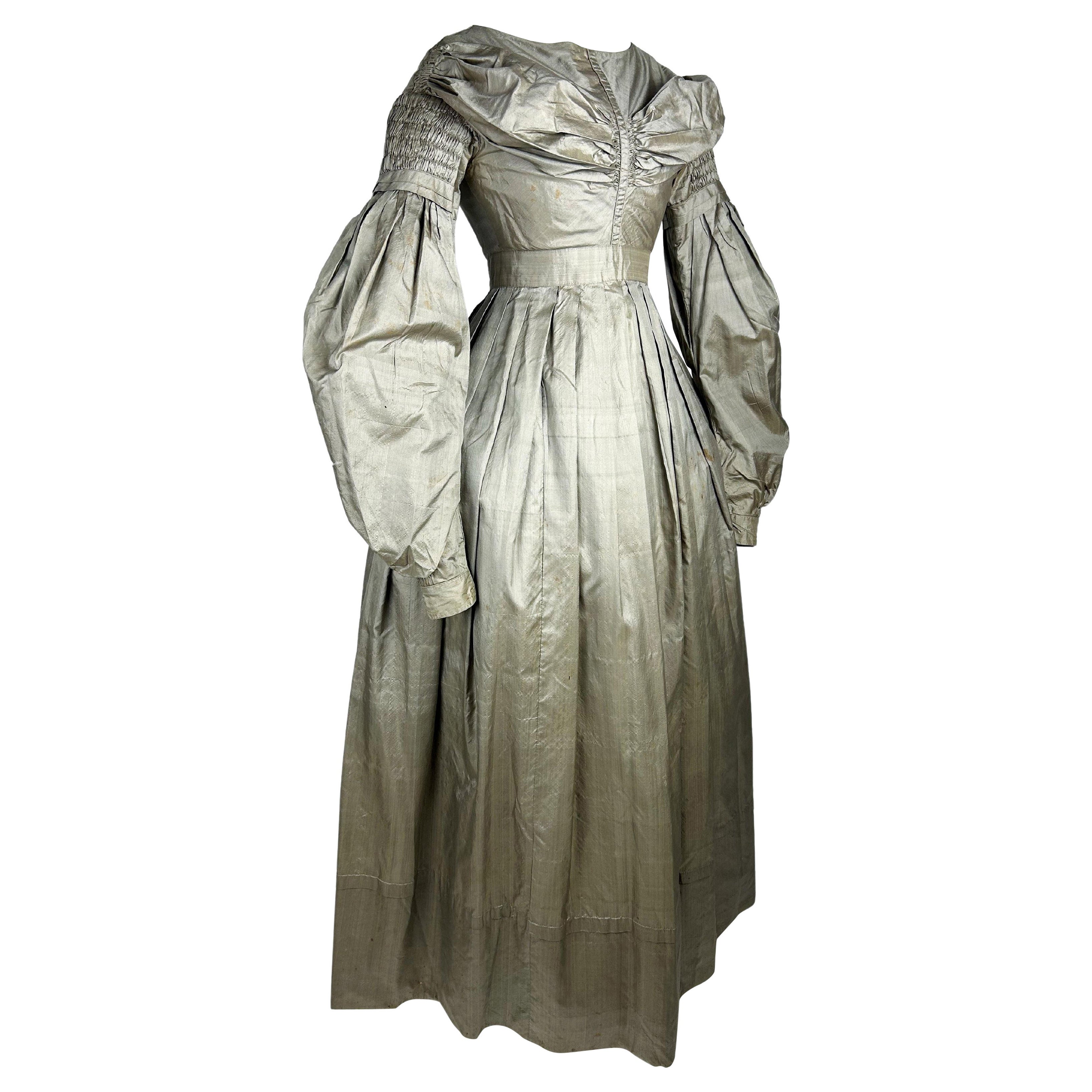 A bronze taffetas day dress with mutton's sleeves - France Circa 1840
