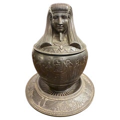 Tarro canopo de metal bronceado, principios del siglo XX
