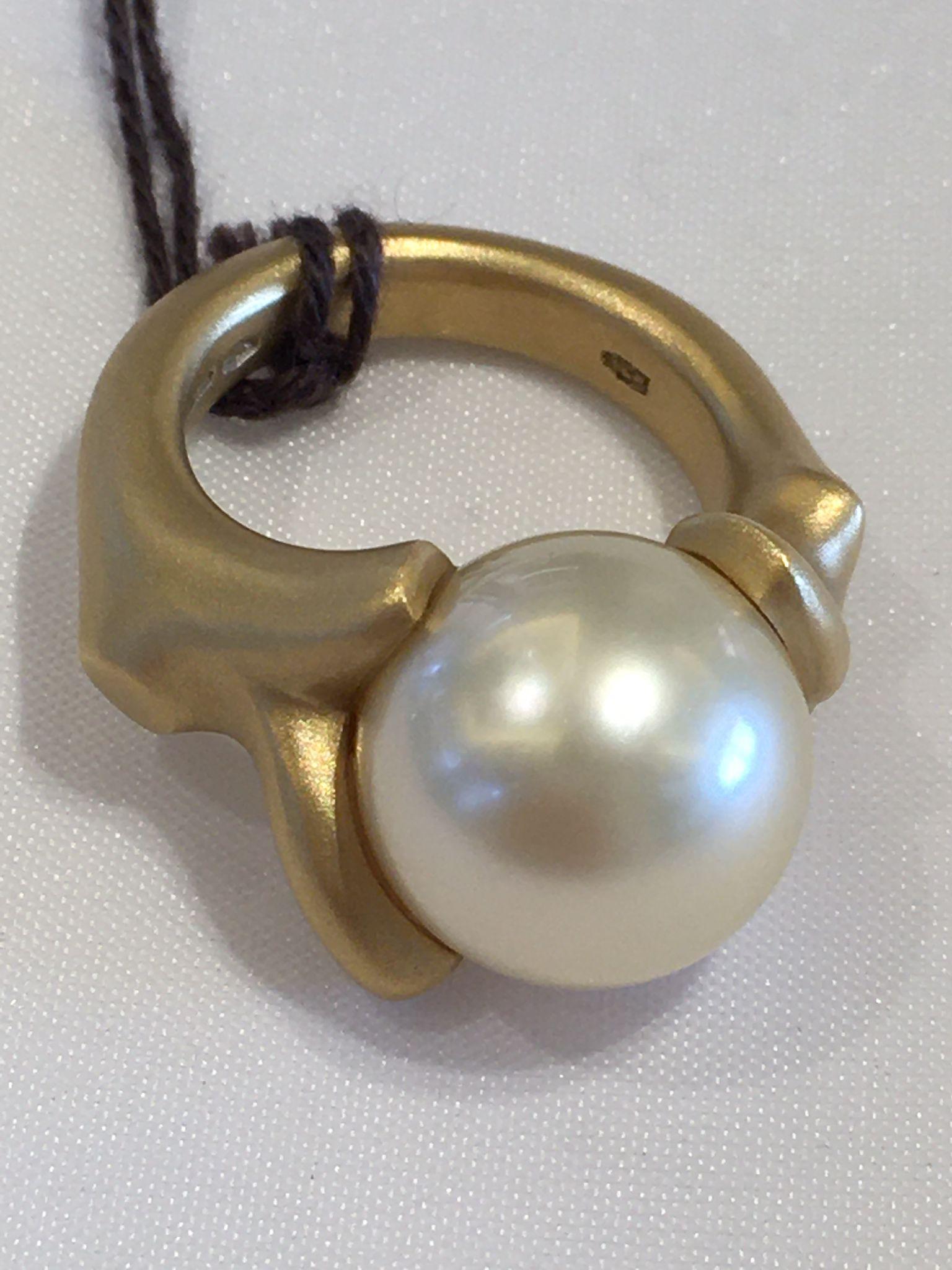 Women's A brush 18kt yellow gold ring with a 5+ plus South Sea light pearl. For Sale