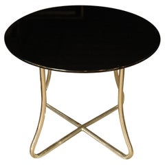 A Brutalist  Art Deco Black Glazed Round Side Table With Curved Steel Frame
