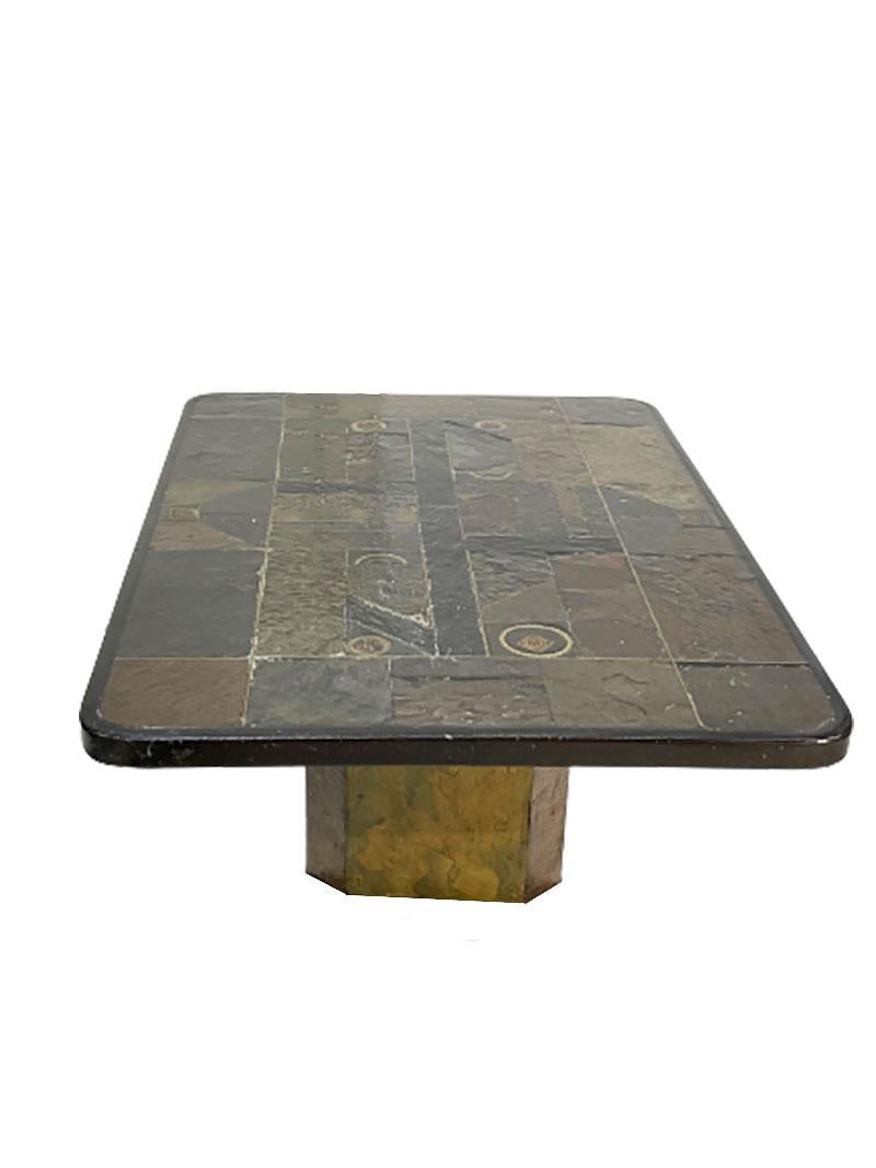A Brutalist coffee table designed by Paul Kingma

A brutalist coffee table designed by Paul Kingma and made of various stone types in mosaic between 2 colors of bronze in red and yellow
Signed by Ebel
Consists of 2 parts, which the top of the