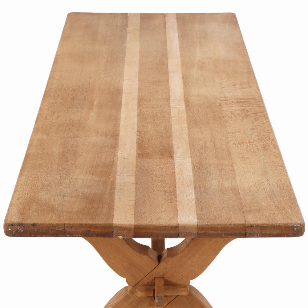 20th Century A Brutalist French oak sawbuck table, C. 1950. For Sale