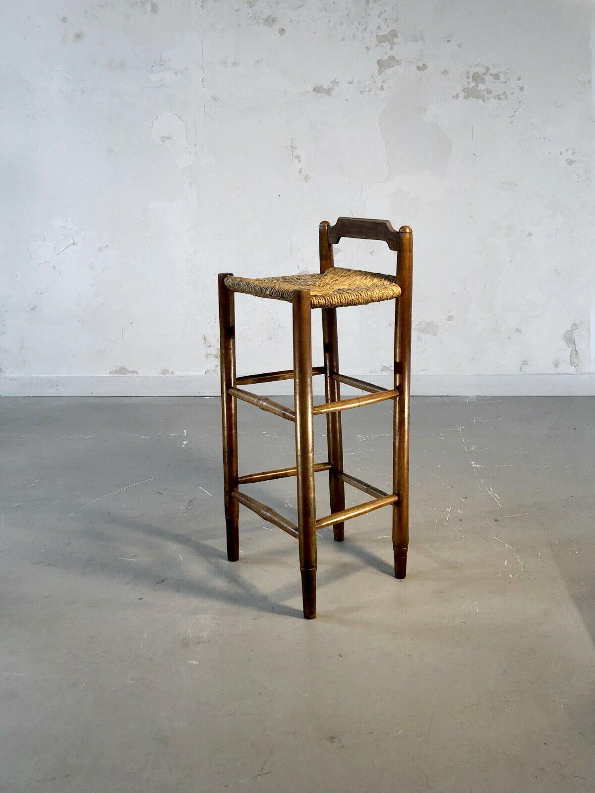 A high bar chair, Folk Art, Rustic Modern, Modernist, solid brown wood structure with 2 slightly inclined rear legs, straw seat, low back with elegant line, to be attributed, France 1950.

To be attributed, any information welcome!!!

DIMENSIONS: H